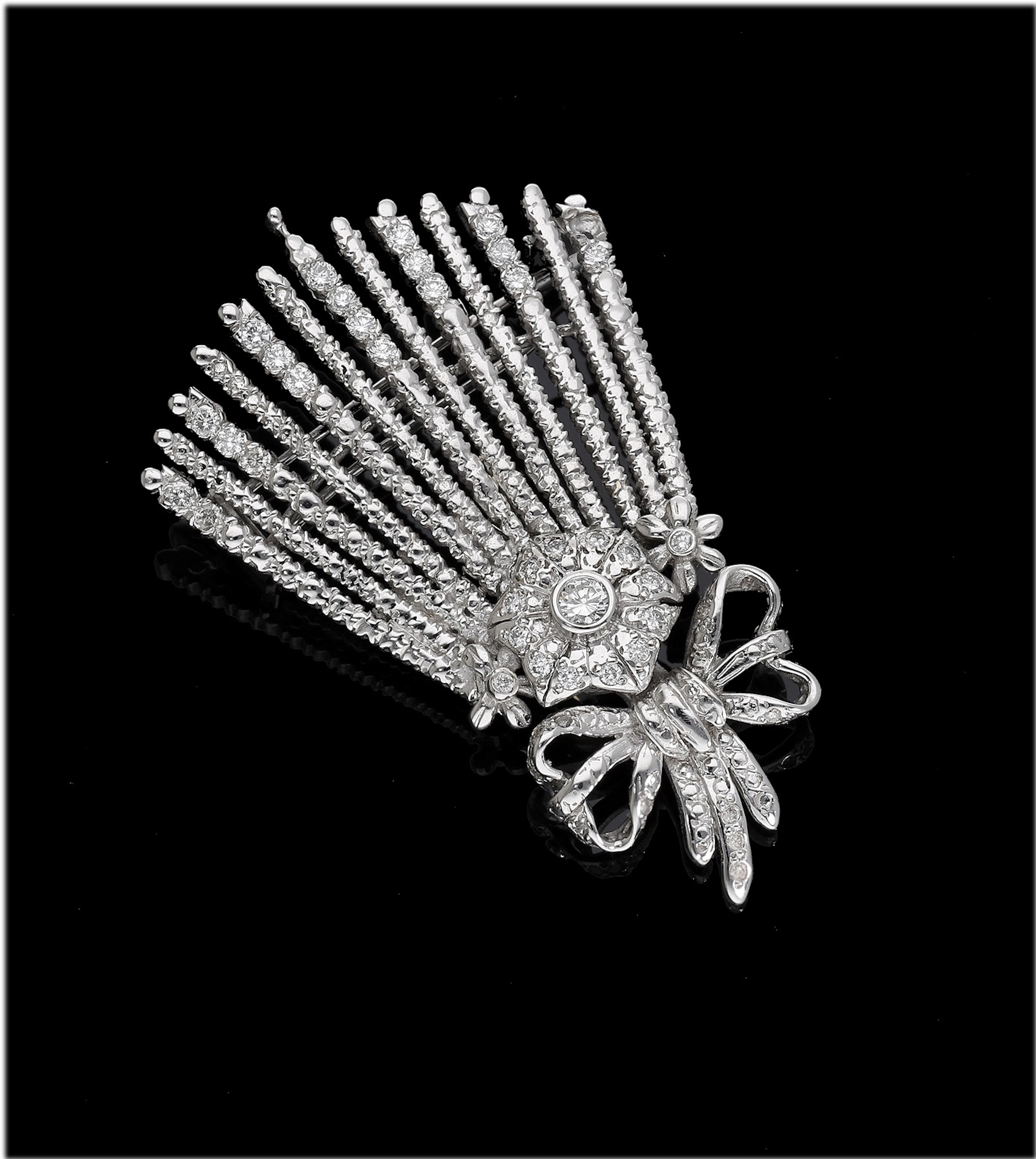 An 18ct gold and diamond ‘Chelengk’ brooch/pendant, fashioned after
