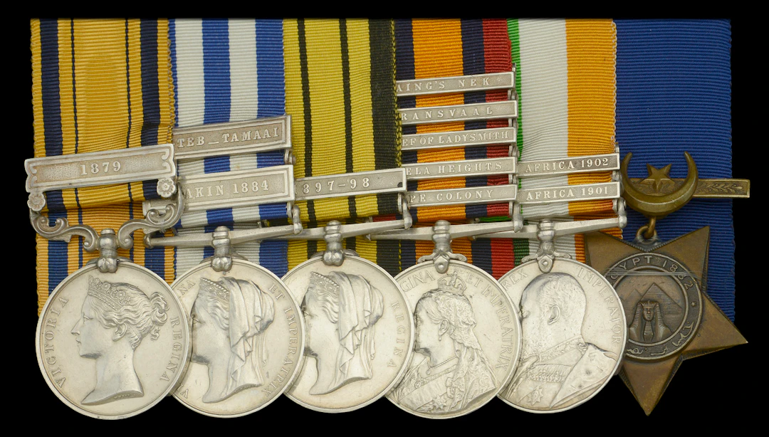 Six: Hon. Captain (Q.M.) W. C. Harrington, King’s Royal Rifle Corps