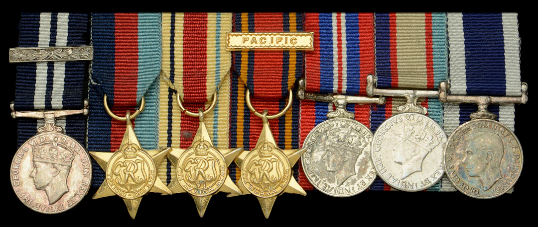 A Second War D.S.M. and Second Award Bar mounted group of seven miniature
