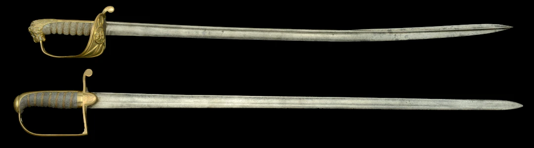 Early Royal Navy Swords. Two Swords, the first example, circa 1805