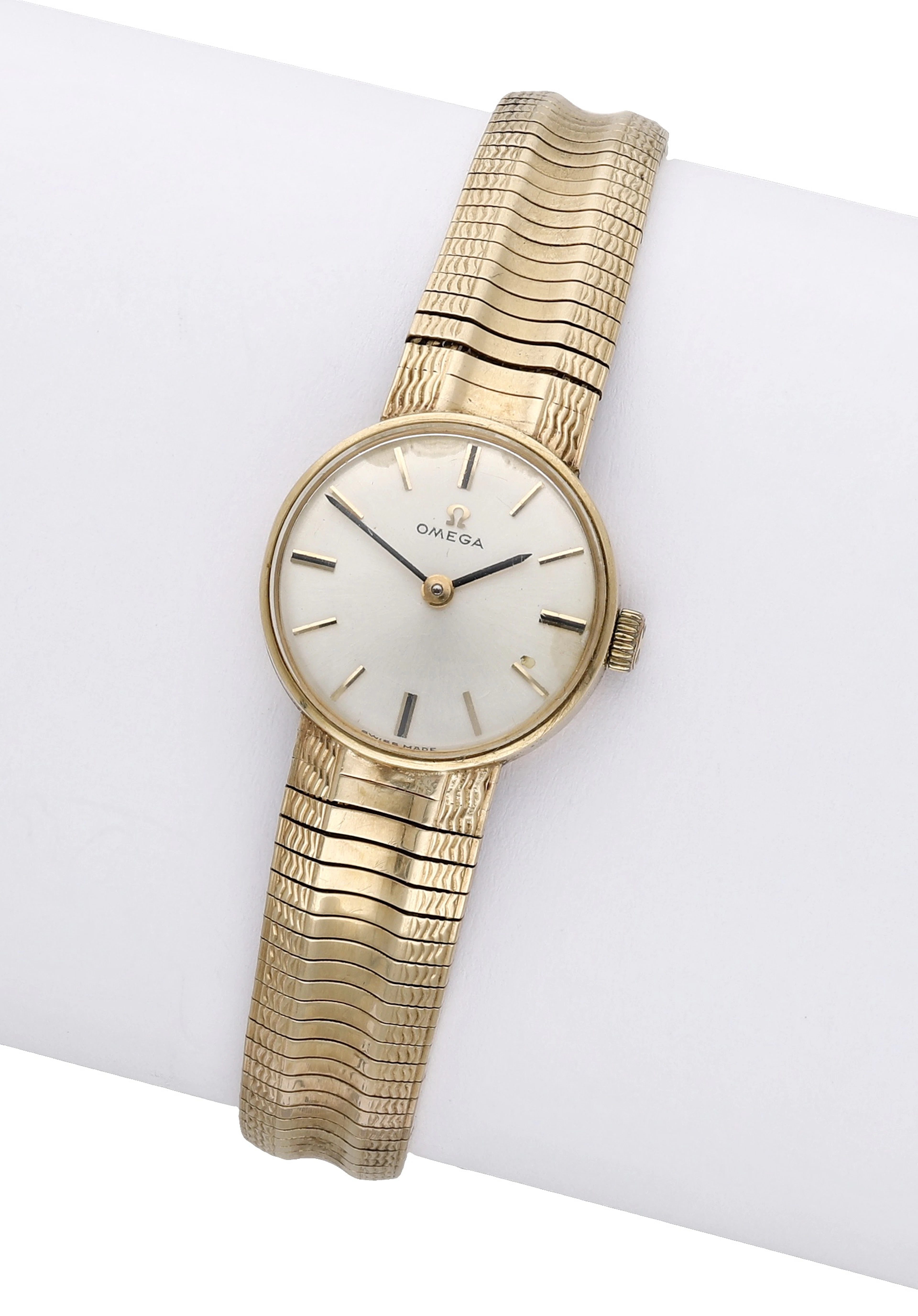 Omega. A lady’s gold bracelet watch, circa 1964. Movement: cal. 620