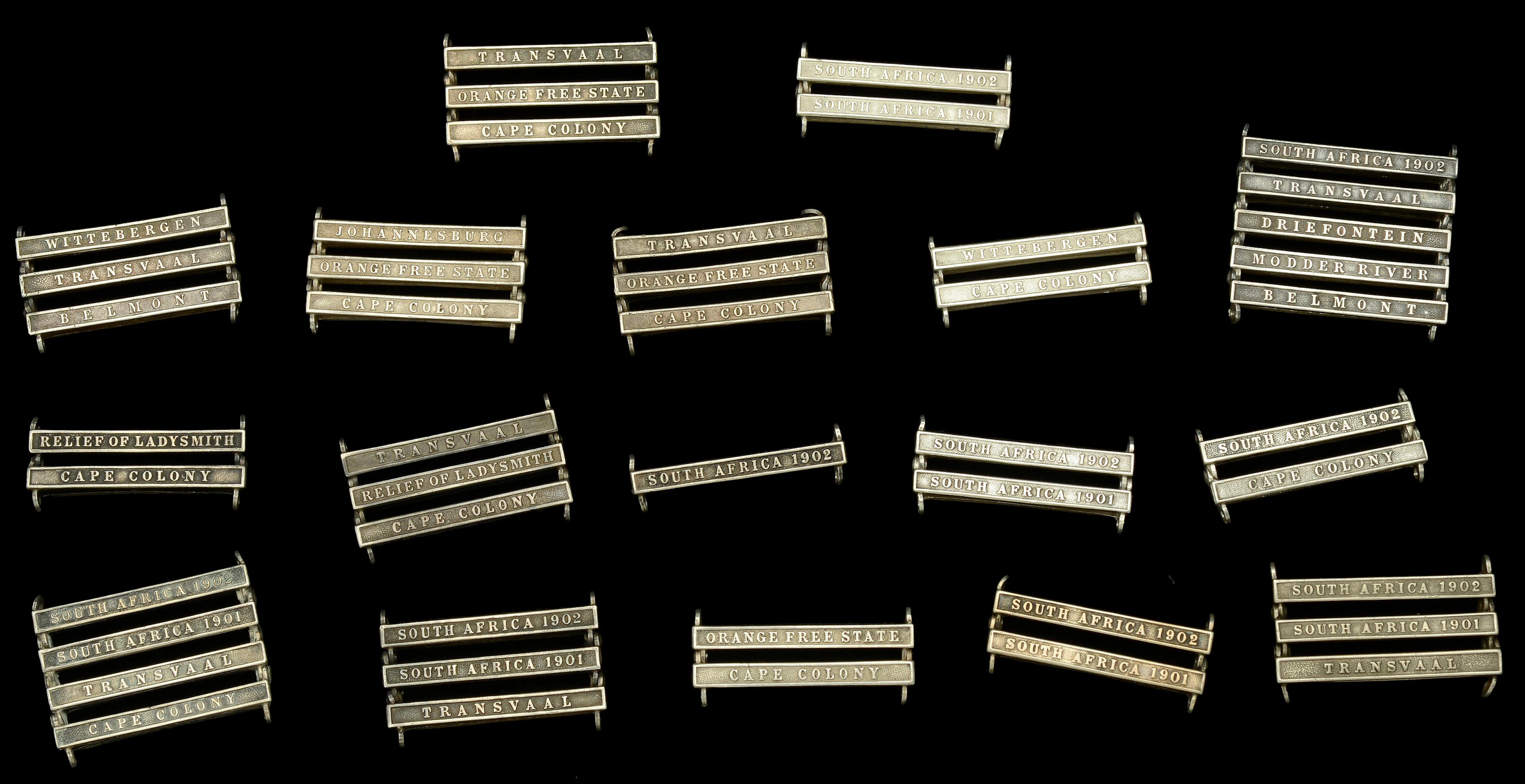 Clasps: A selection of clasps for the Queen’s South Africa Medal