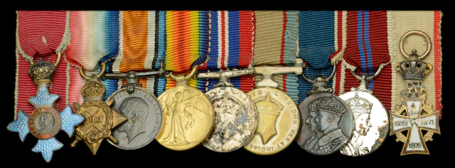 A post-War C.B.E. mounted group of nine miniature dress medals attributed