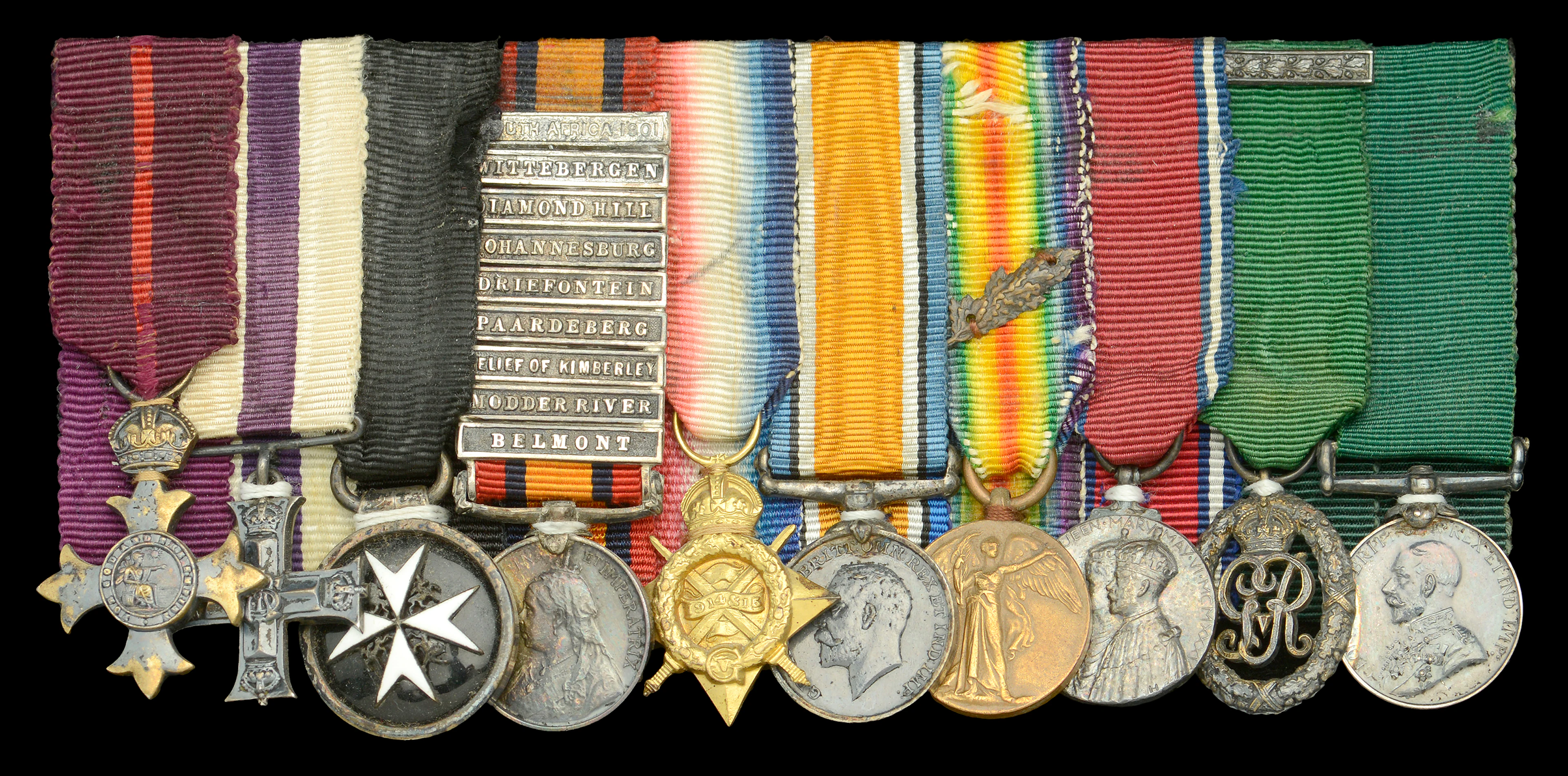 A Great War O.B.E., M.C. mounted group of ten miniature dress medals