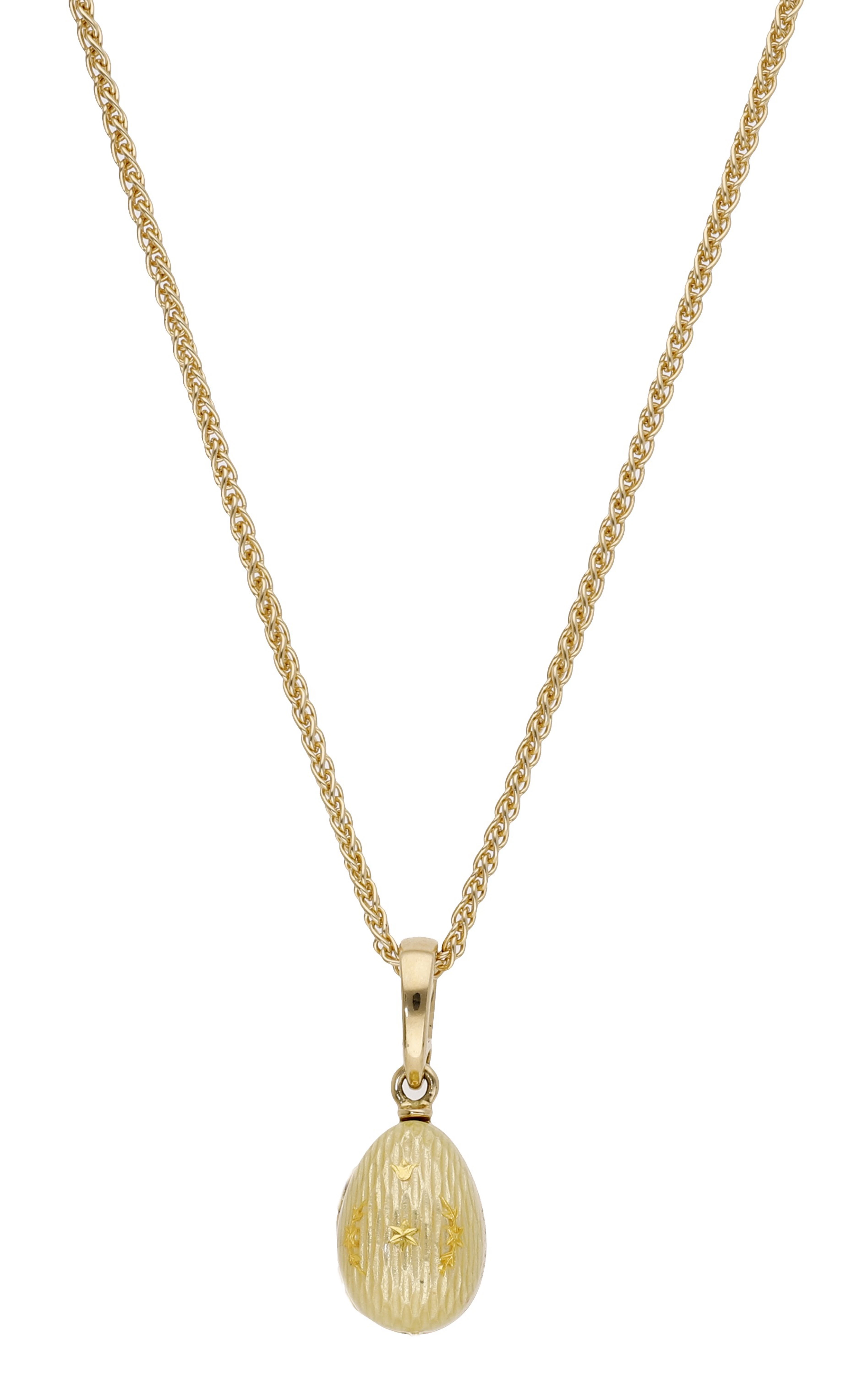 An enamel egg pendant by Fabergé, the yellow guilloché enamel egg