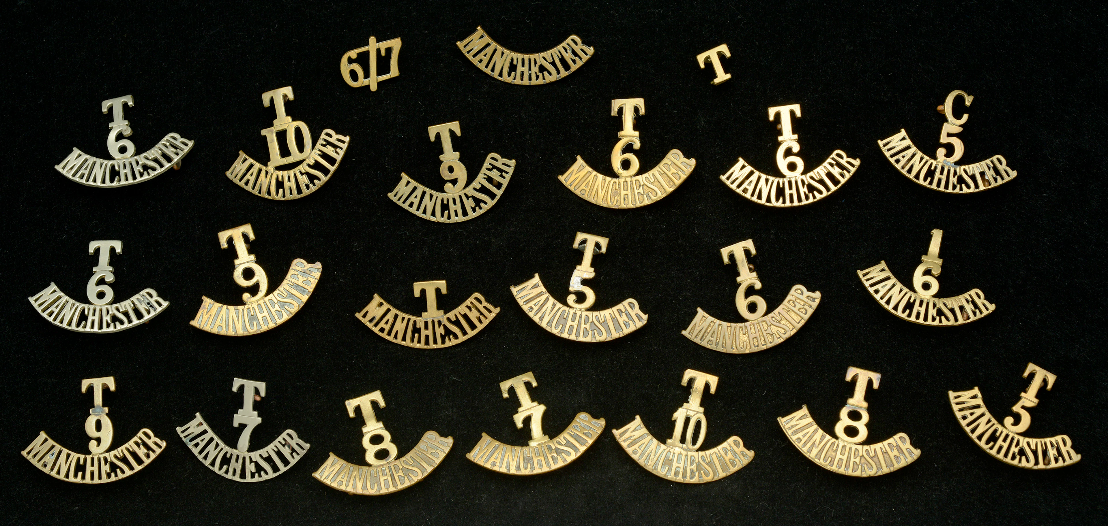 Manchester Regiment, Assorted Shoulder Titles. A good selection with