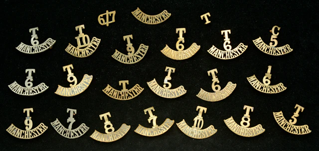 Manchester Regiment, Assorted Shoulder Titles. A good selection with