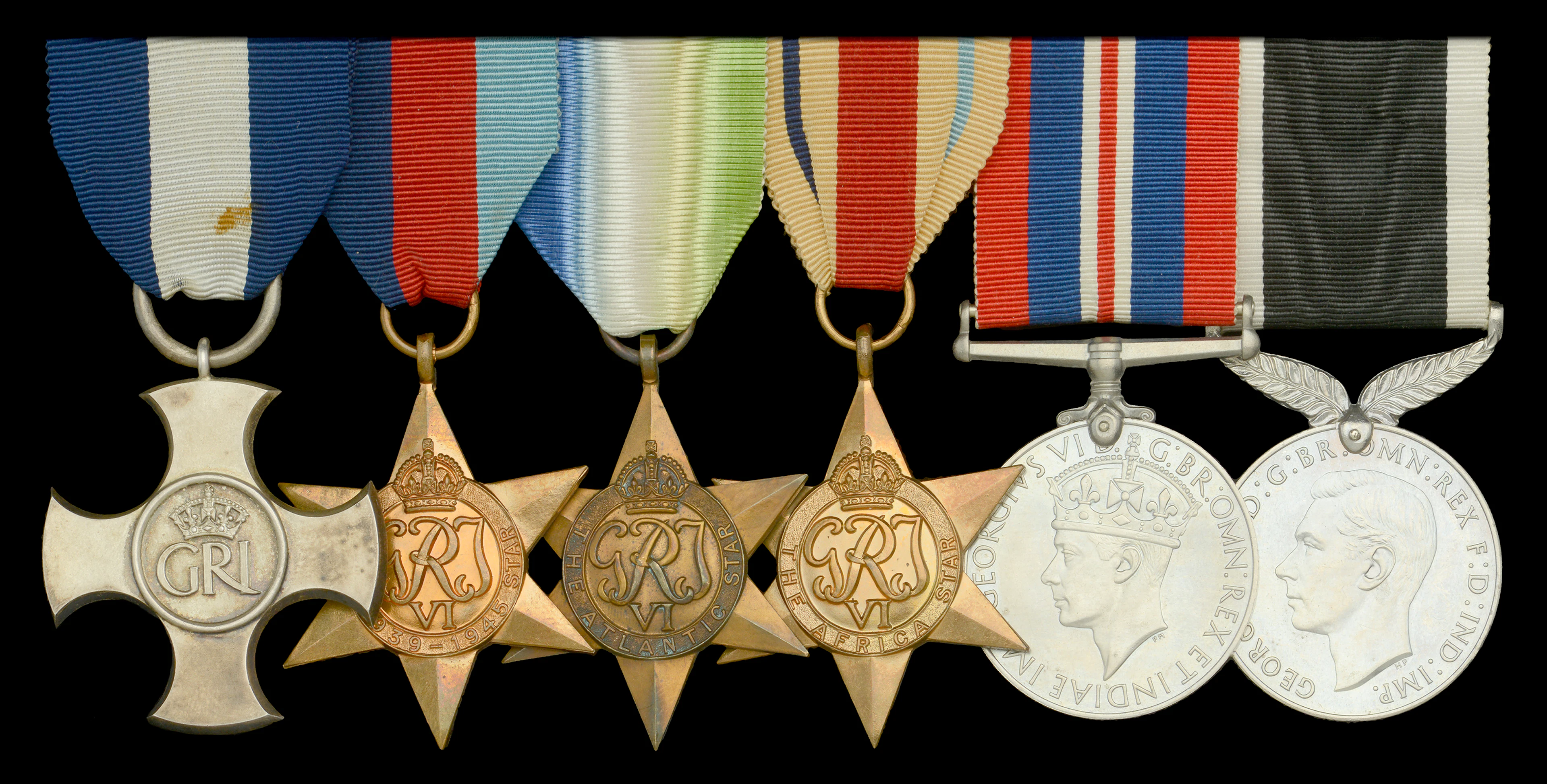 A Second War D.S.C. group of six attributed to Lieutenant Commander