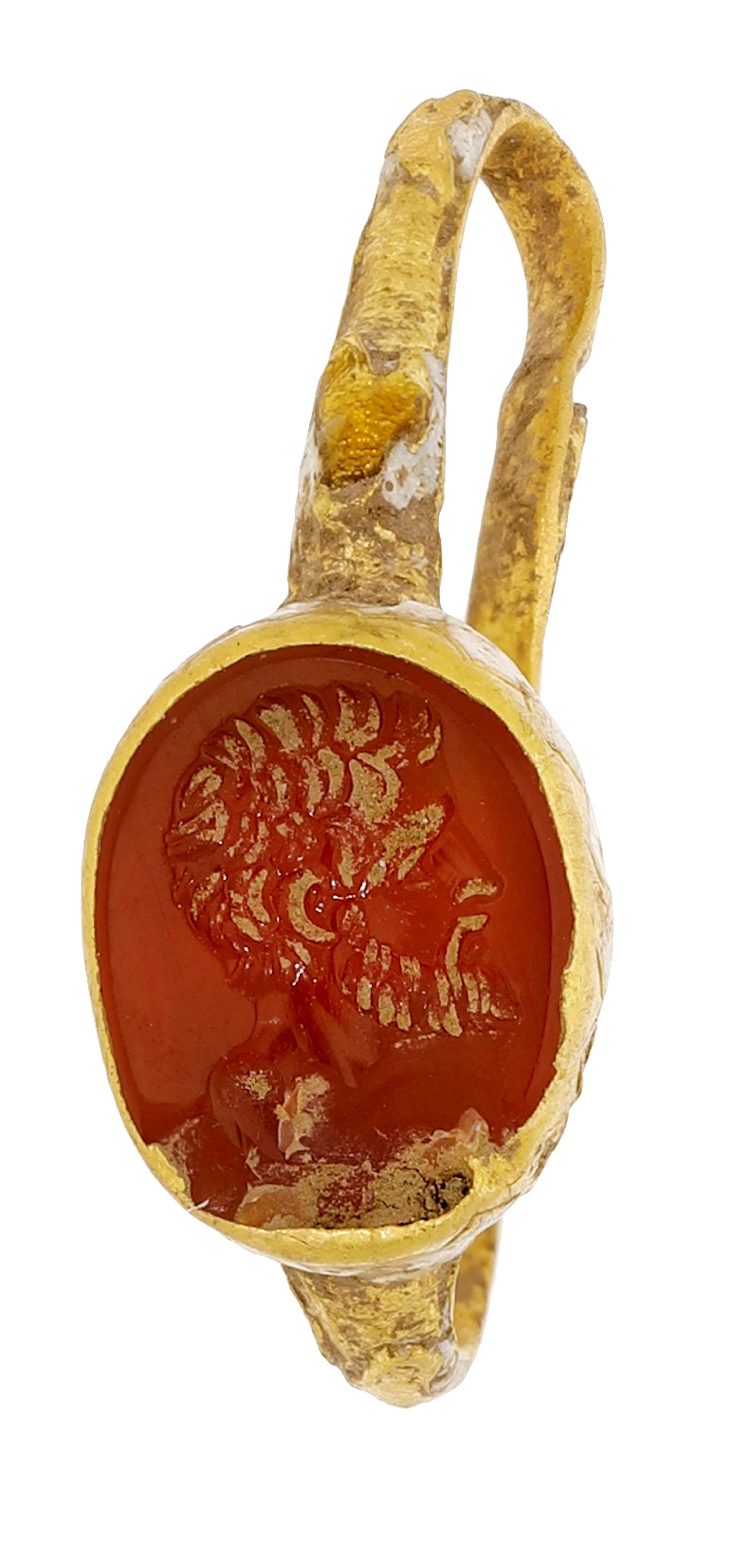 A 16th - 17th century intaglio carnelian inset ring, the oval carnelian