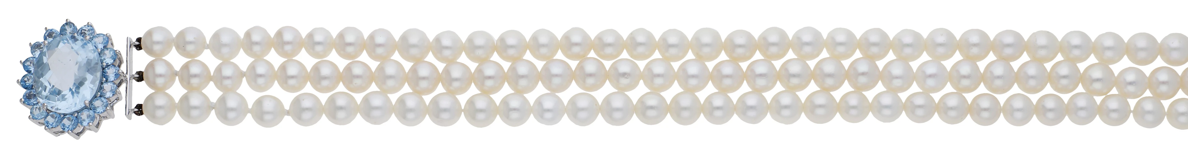 A three row cultured pearl and blue topaz necklace, the three rows