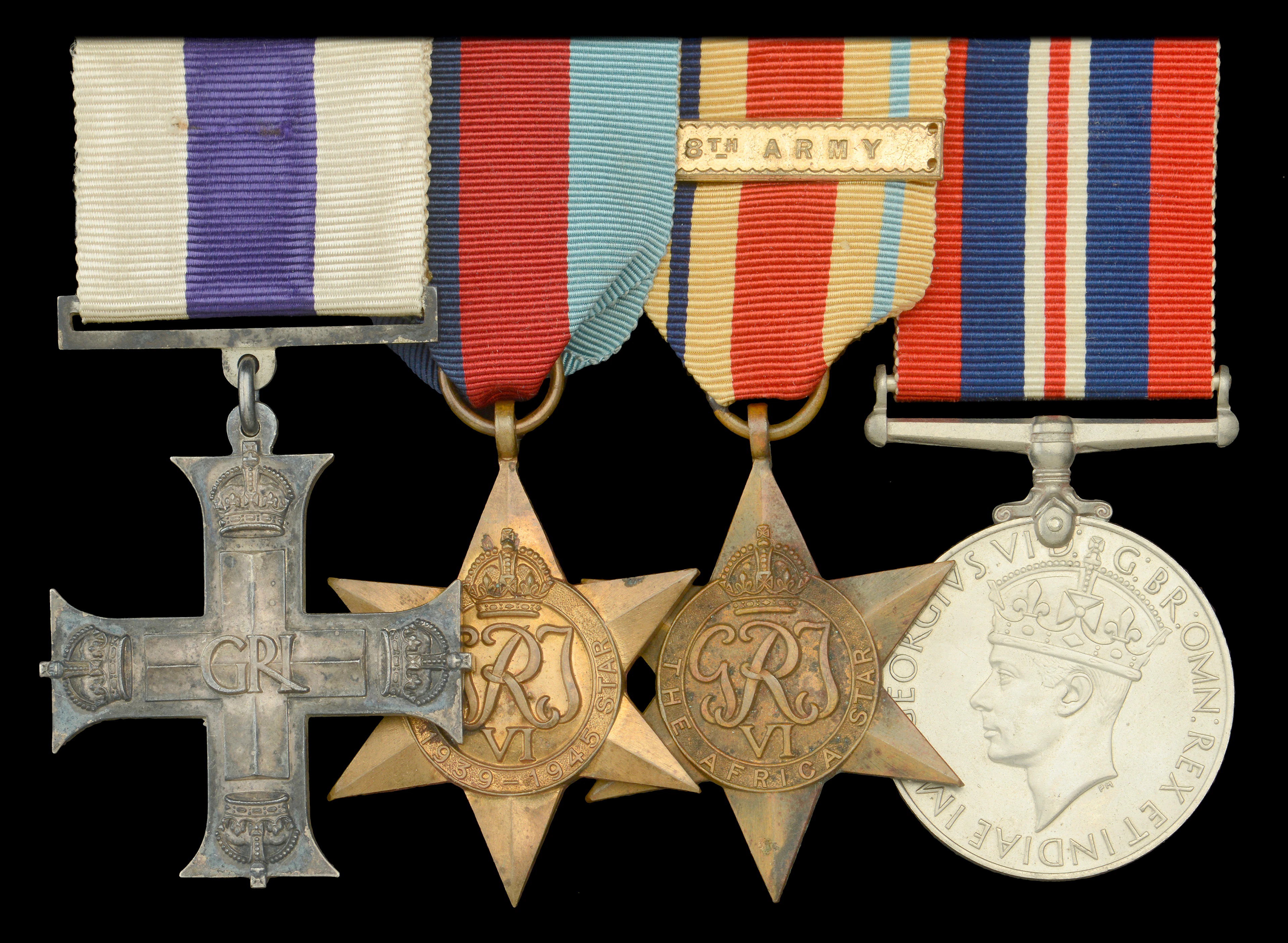 A Second War ‘North Africa’ M.C. group of four awarded to Captain