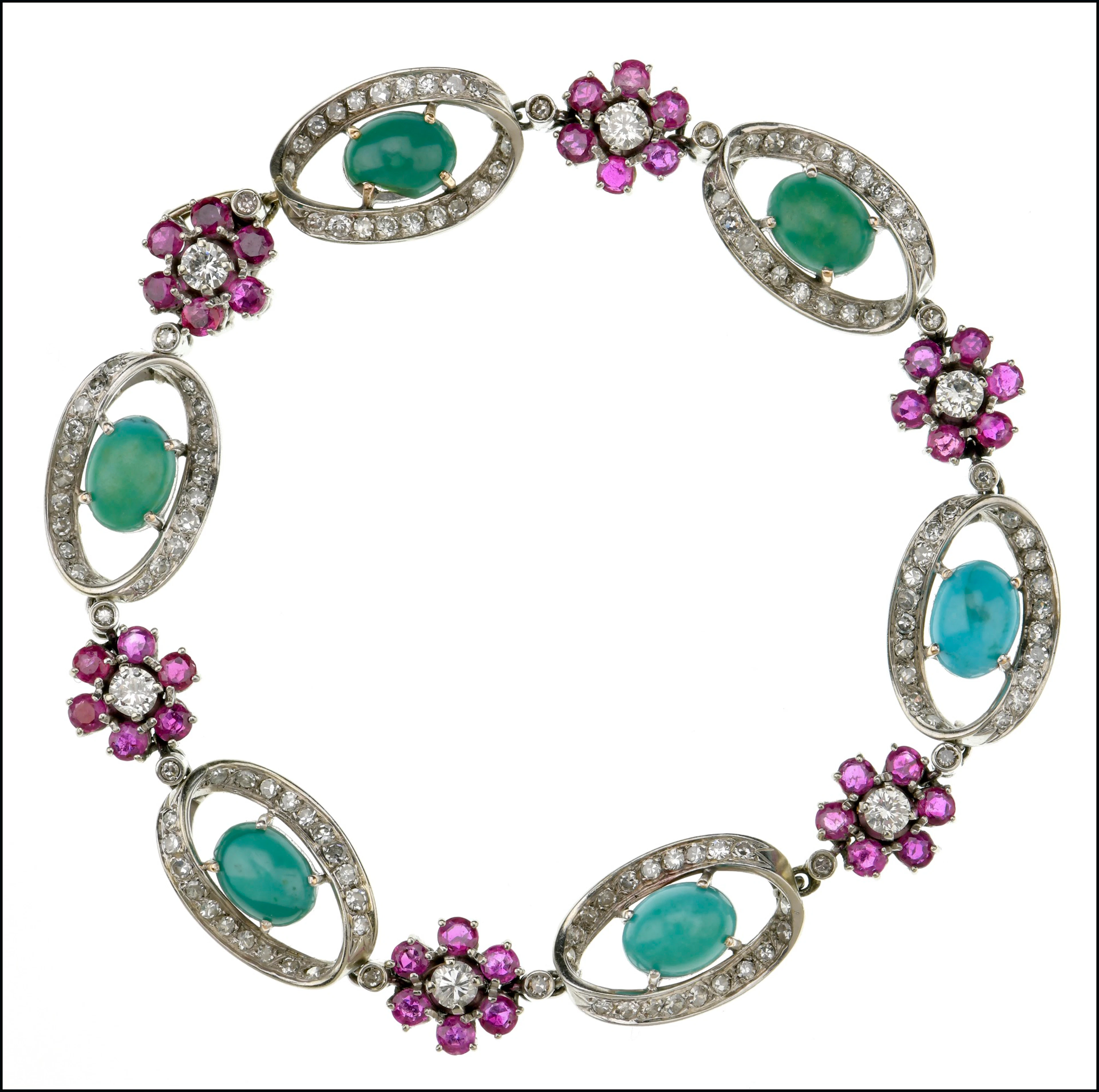 A diamond, turquoise and ruby set bracelet, composed of oval links