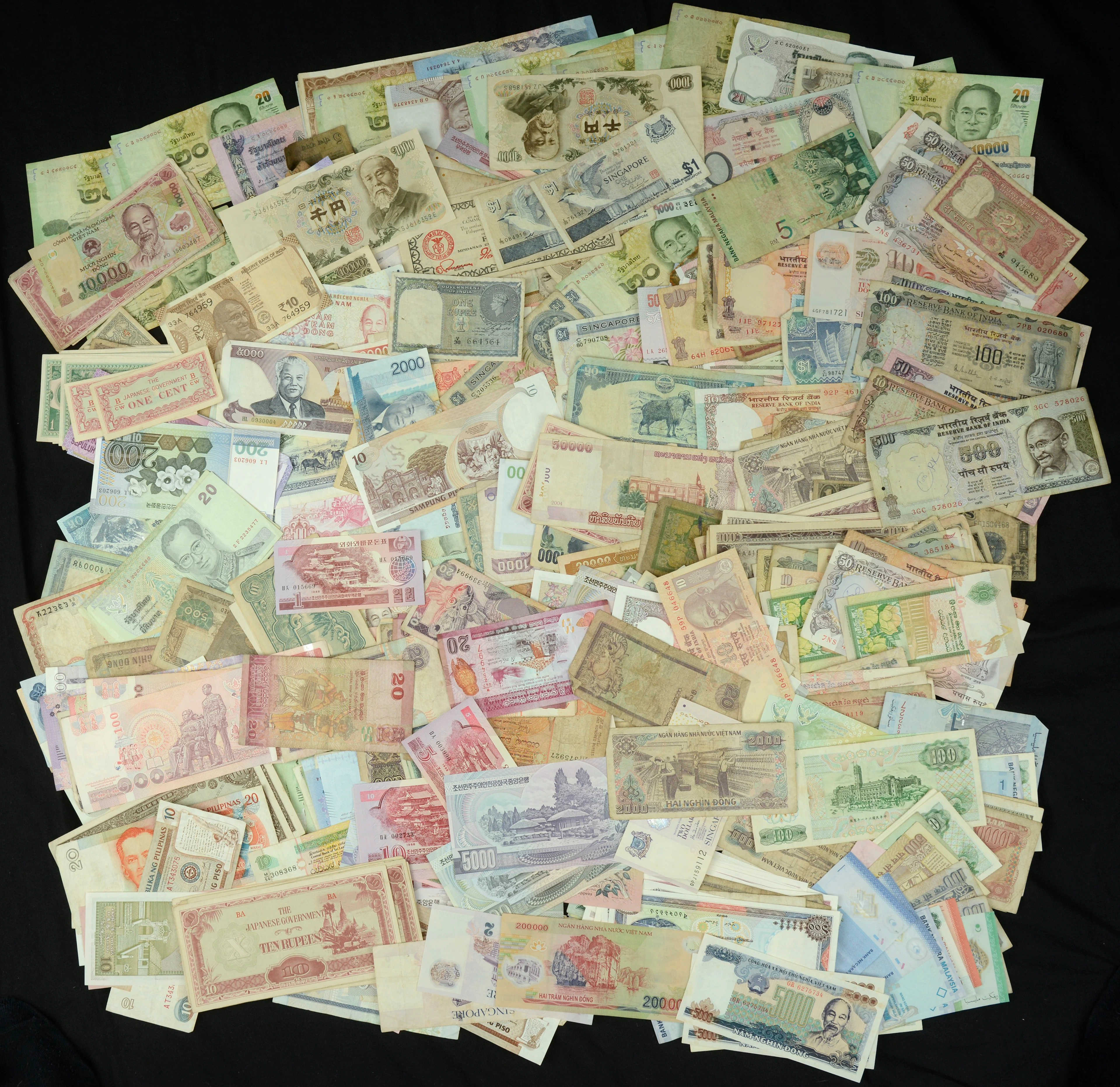A Sizeable Group of Asian Banknotes, including notes from Pakistan