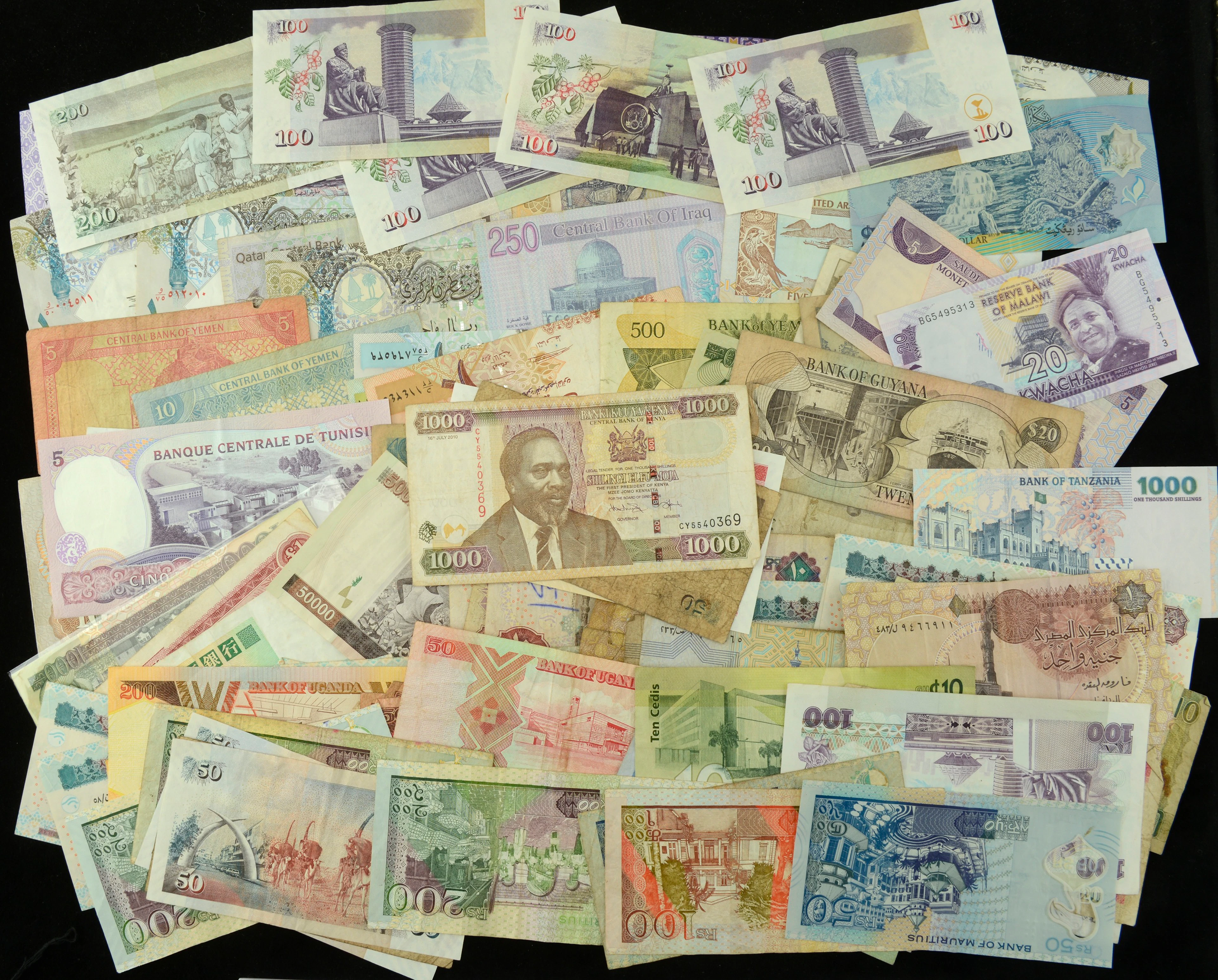 A Large Group of Middle Eastern and African Notes from countries such