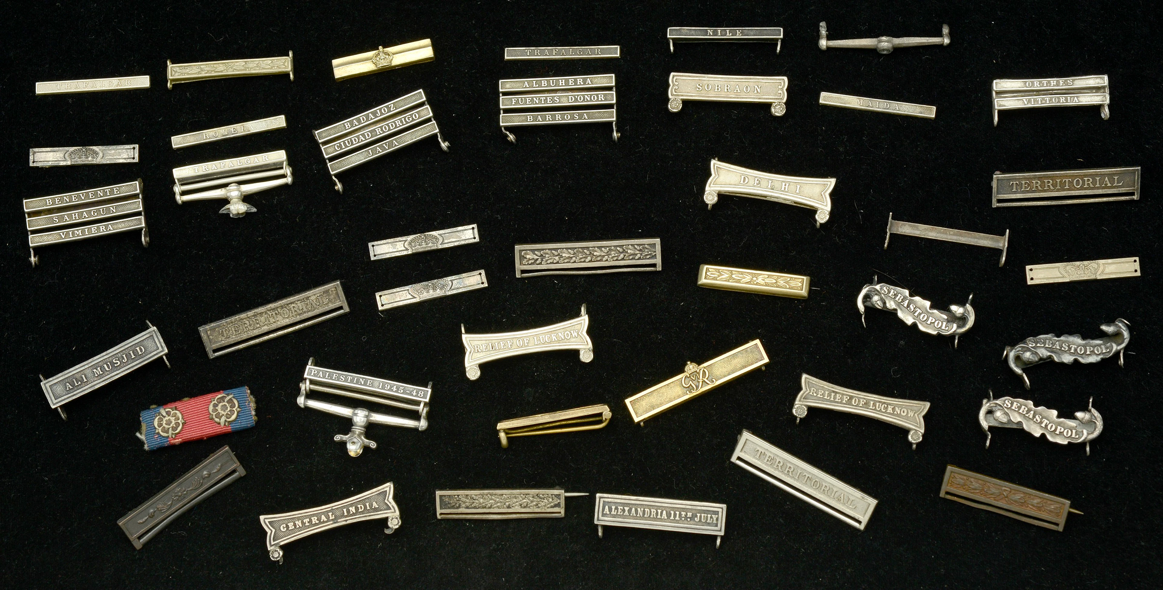 Clasps: A selection of miscellaneous clasps, Second Award bars, and