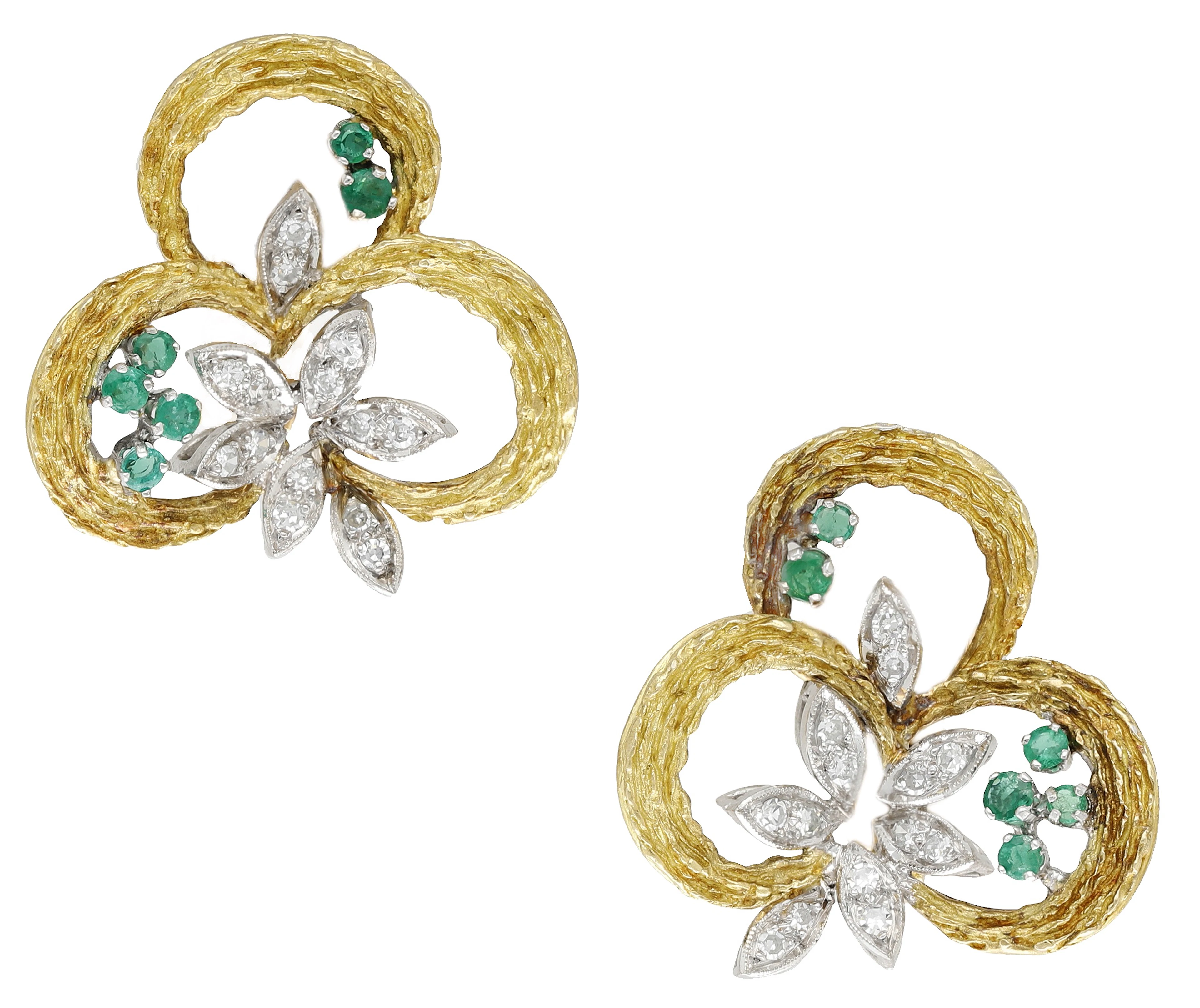 A pair of emerald and diamond ear clips, circa 1970, of bicolour design