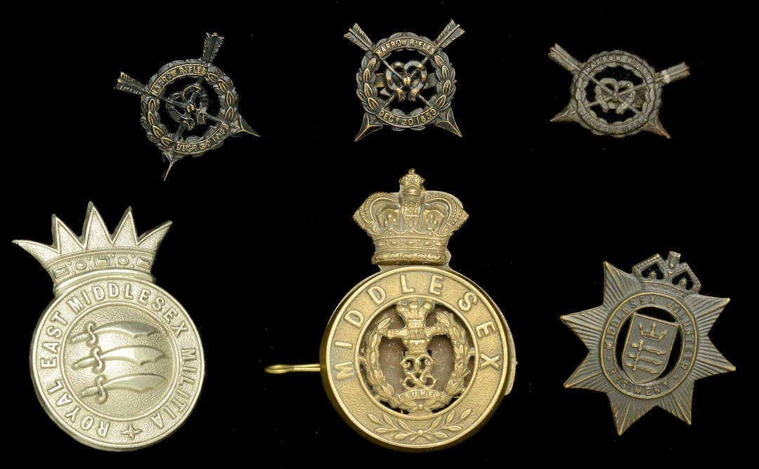Assorted Middlesex Regiment Badges. A good selection including a Middlesex