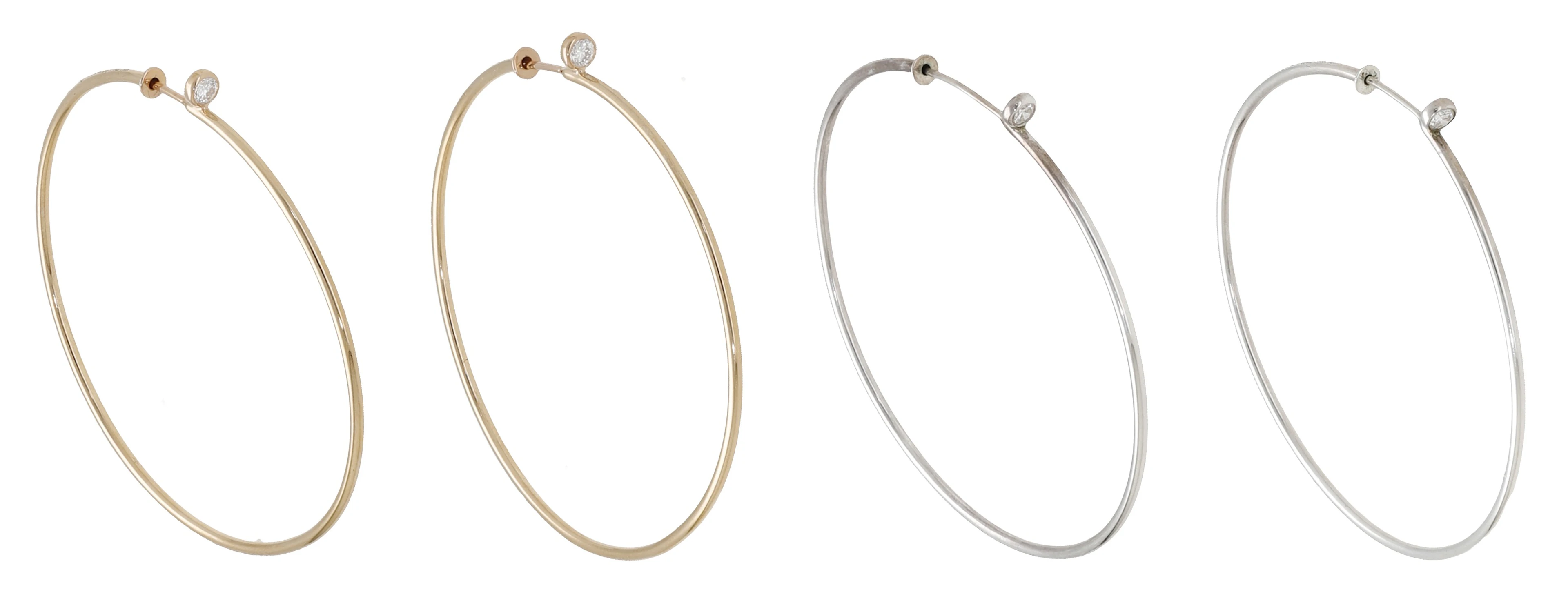 A pair of 18ct gold and diamond ear hoops by Elsa Peretti for Tiffany