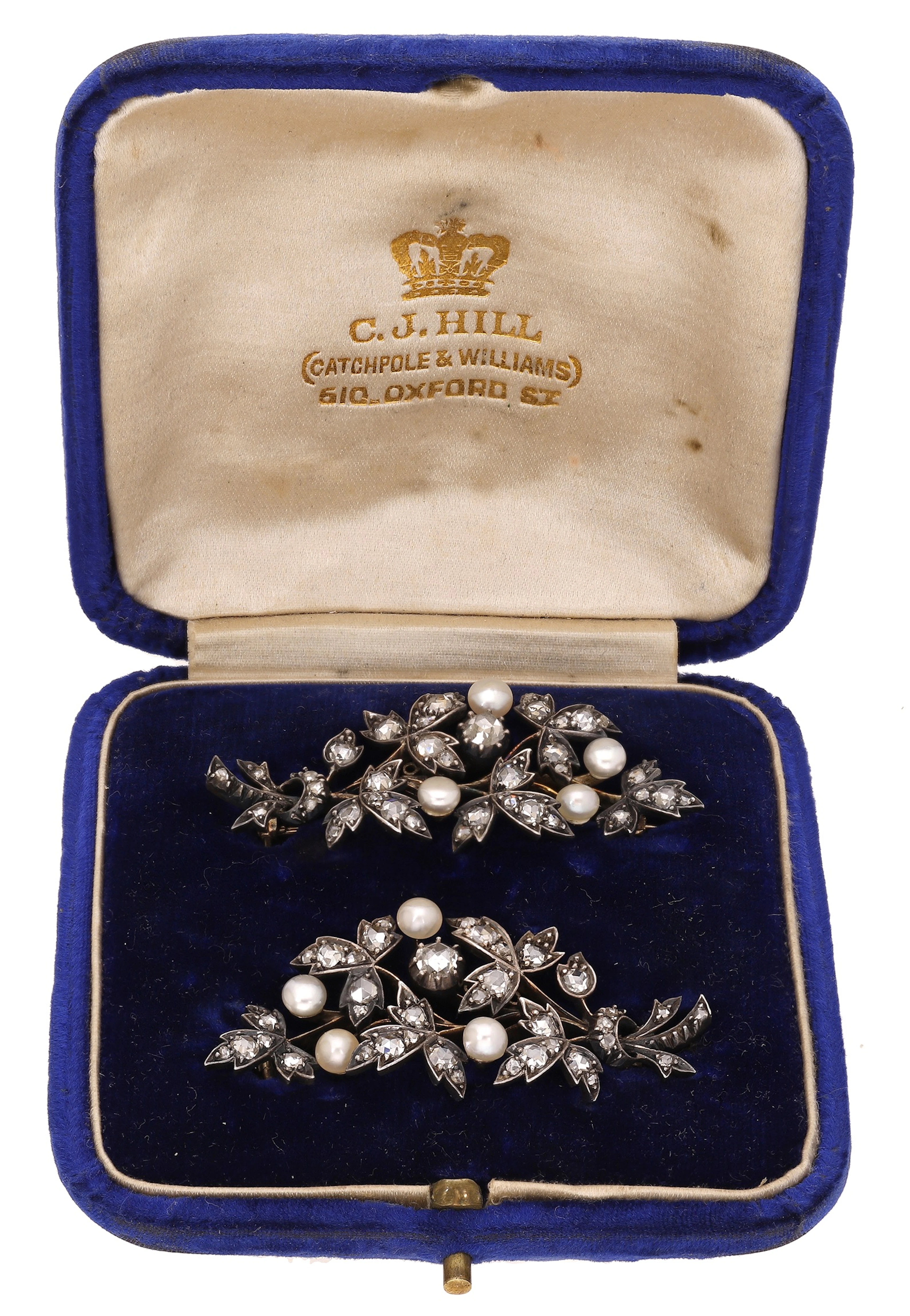A pair of Victorian diamond and pearl spray brooches, the matching