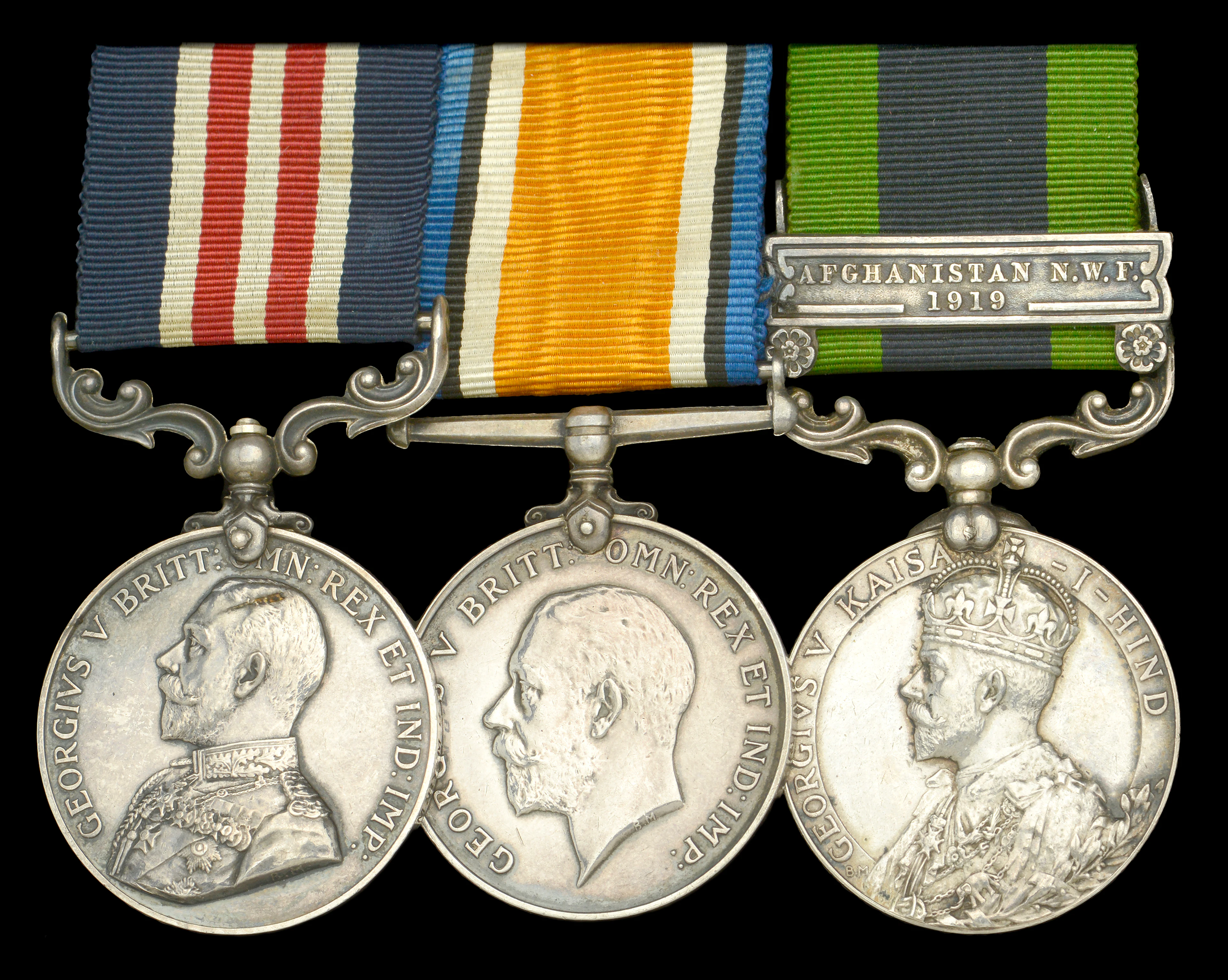 A very scarce Afghanistan 1919 M.M. group of three awarded to Battery