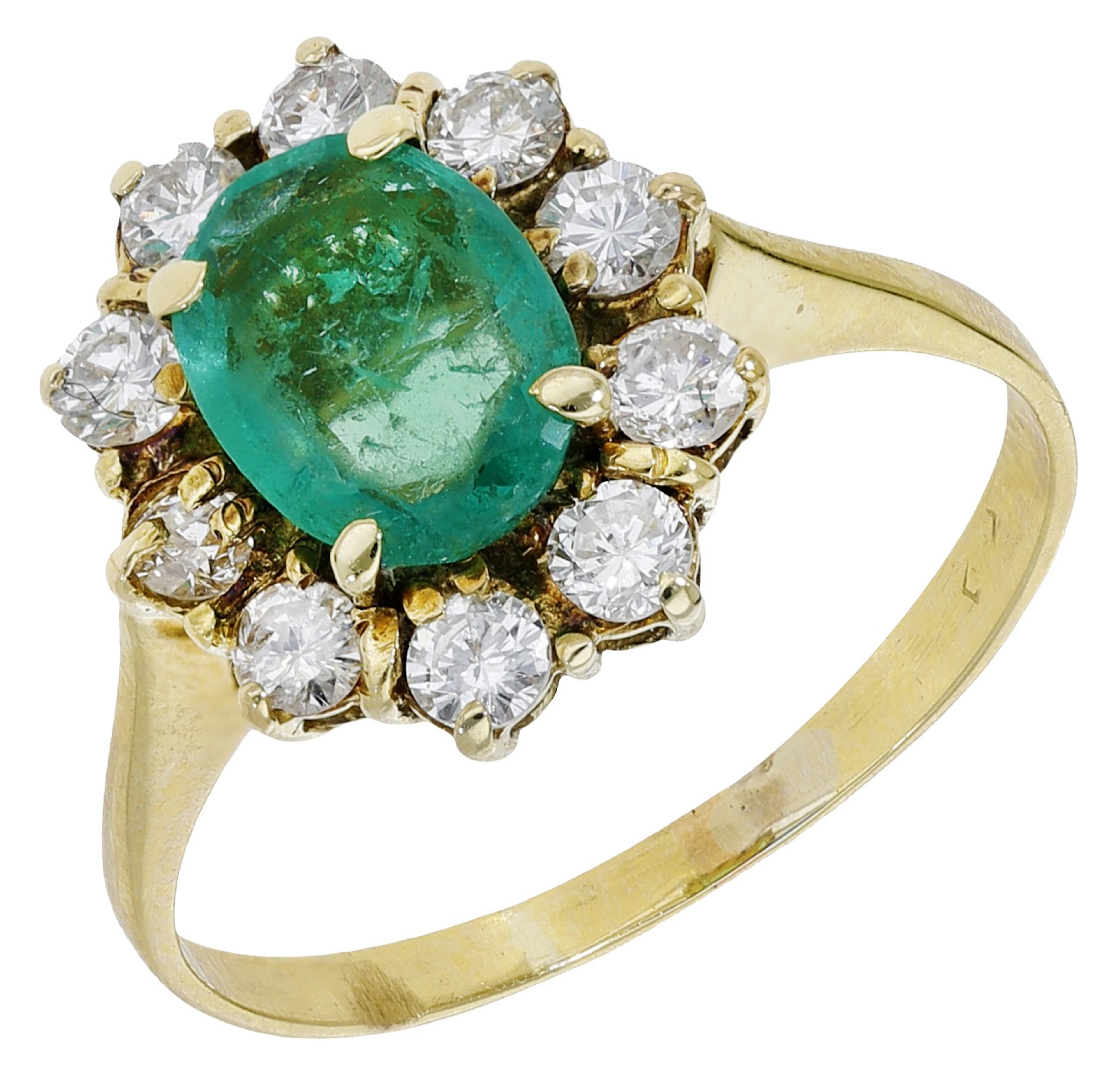 An emerald and diamond cluster ring, the oval mixed-cut emerald within