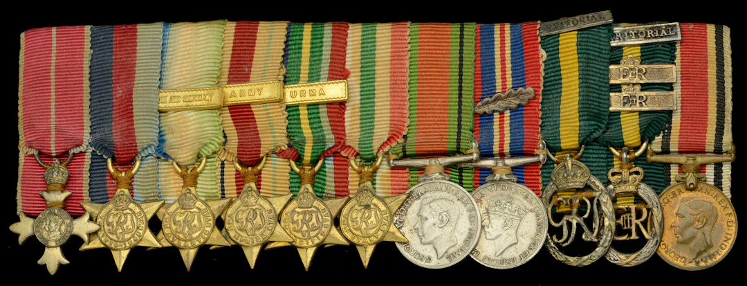 A Second War O.B.E. mounted group of eleven miniature dress medals