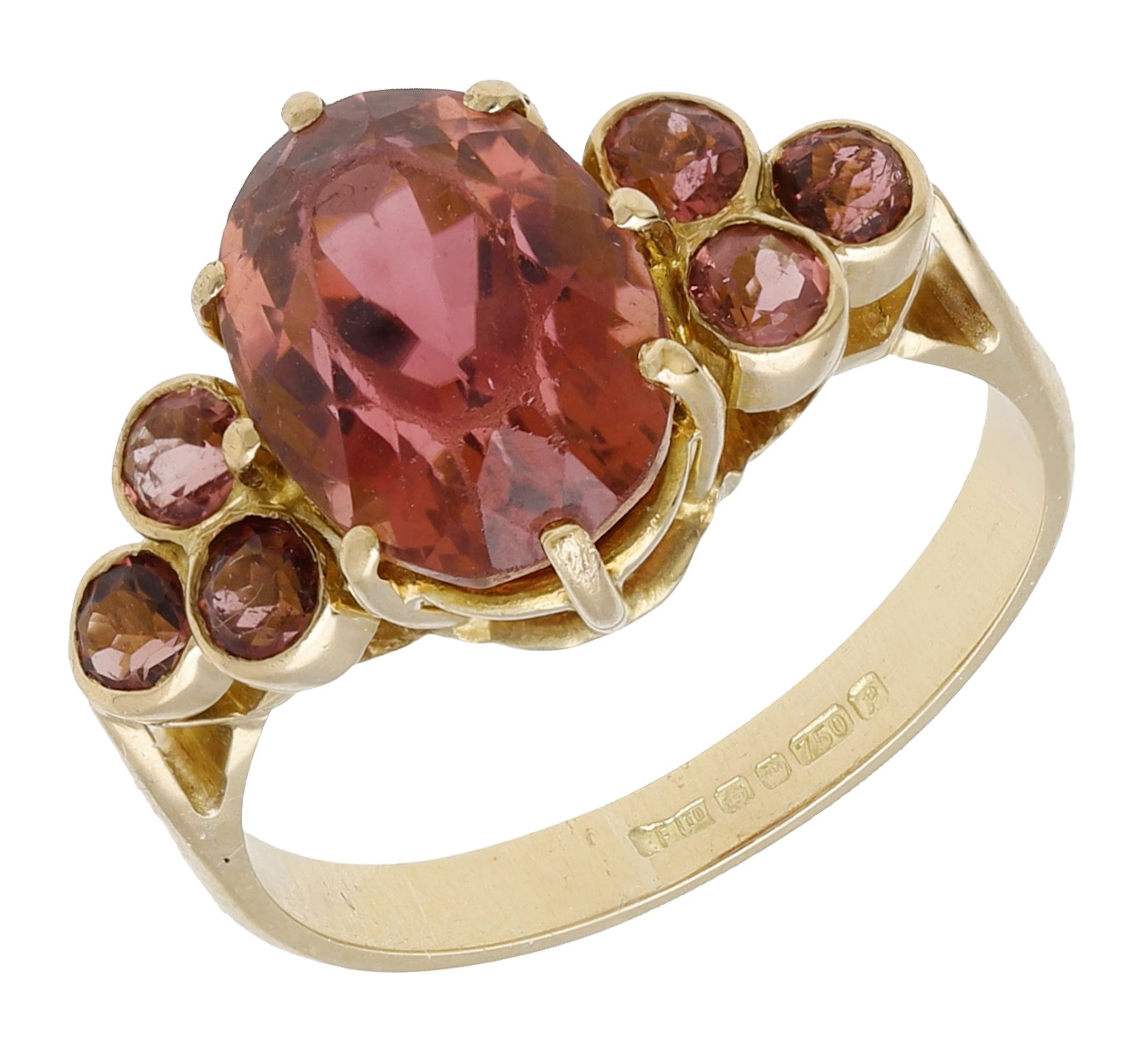 An 18ct gold and tourmaline dress ring, 1989, set with an oval mixed-cut