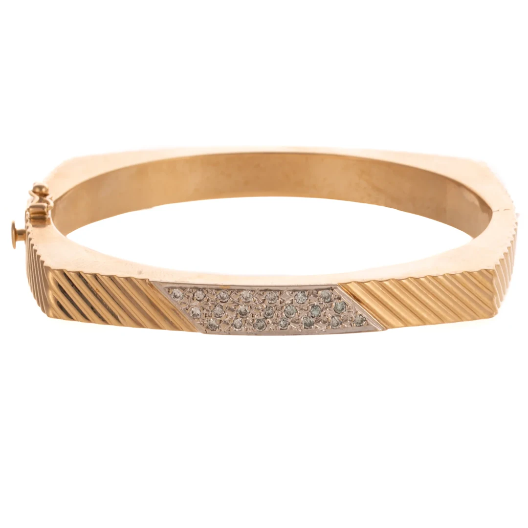 A Modern Pave Diamond Diagonal Bangle in 14K