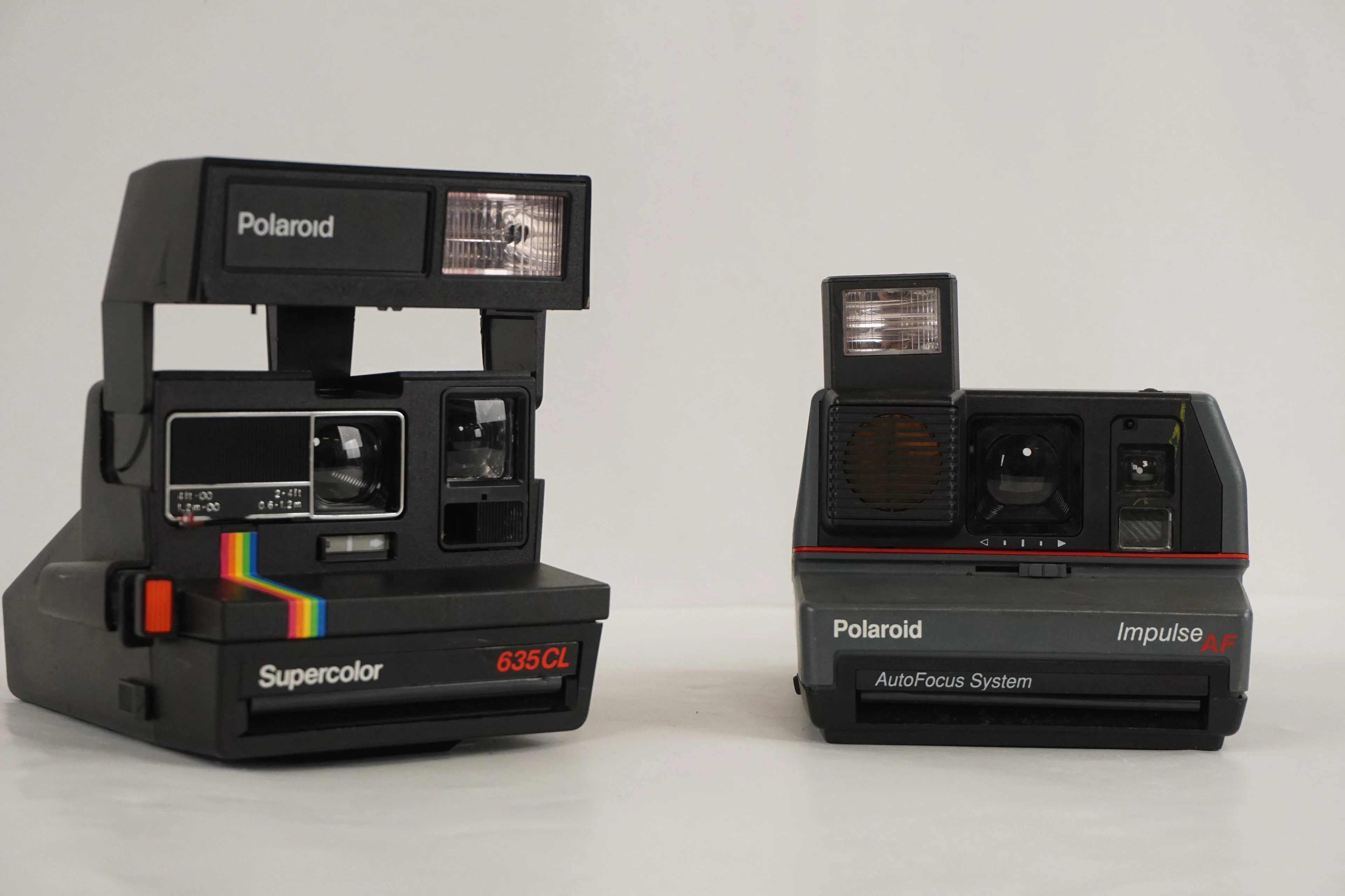 Polaroid Supercolor 635CL & Polaroid Impulse AF. A177