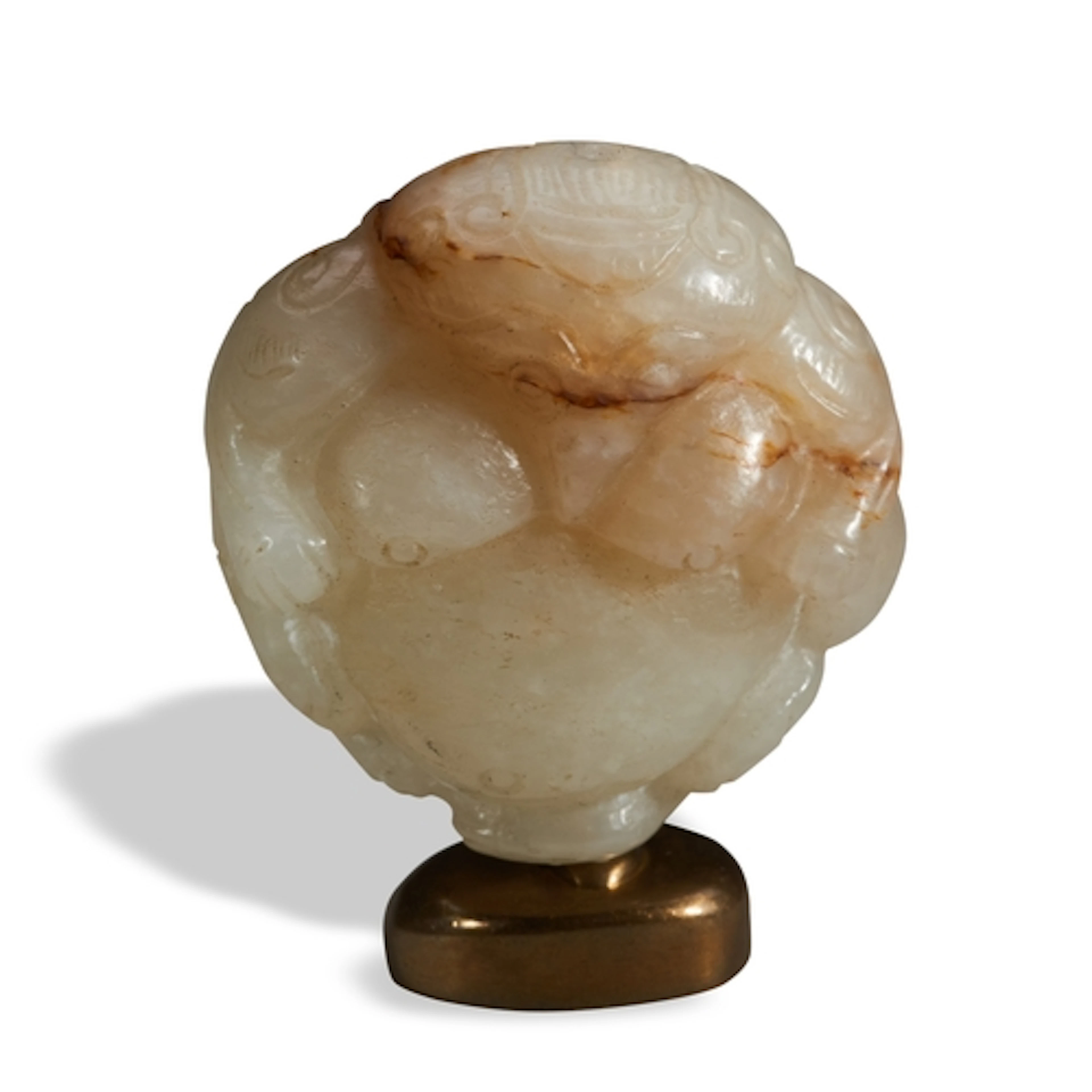 A CELADON AND RUSSET JADE 'GARUDA' PENDANT QING DYNASTY, 18...