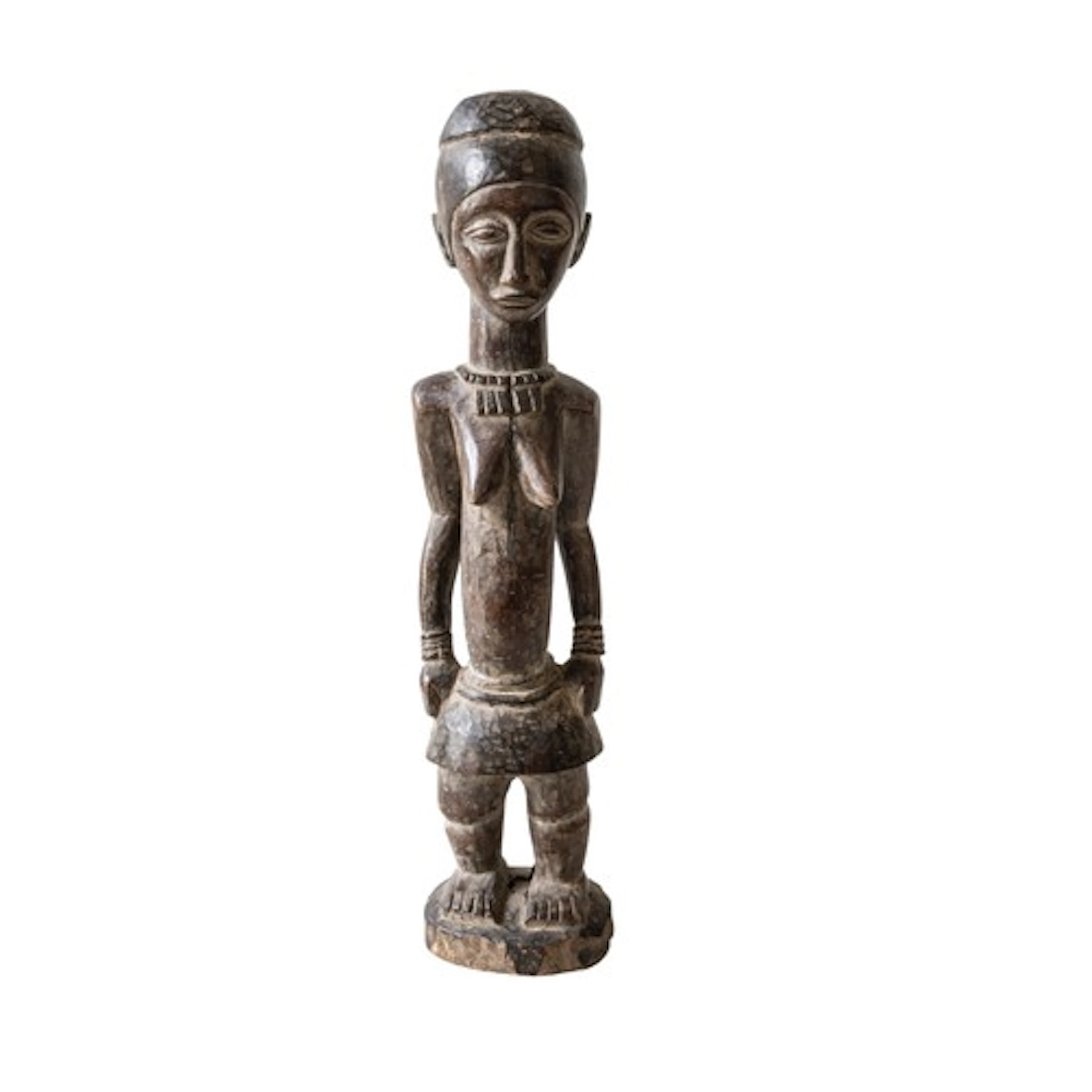 A WEST AFRICAN CARVED WOODEN FEMALE STATUE, possibly Baule, ...