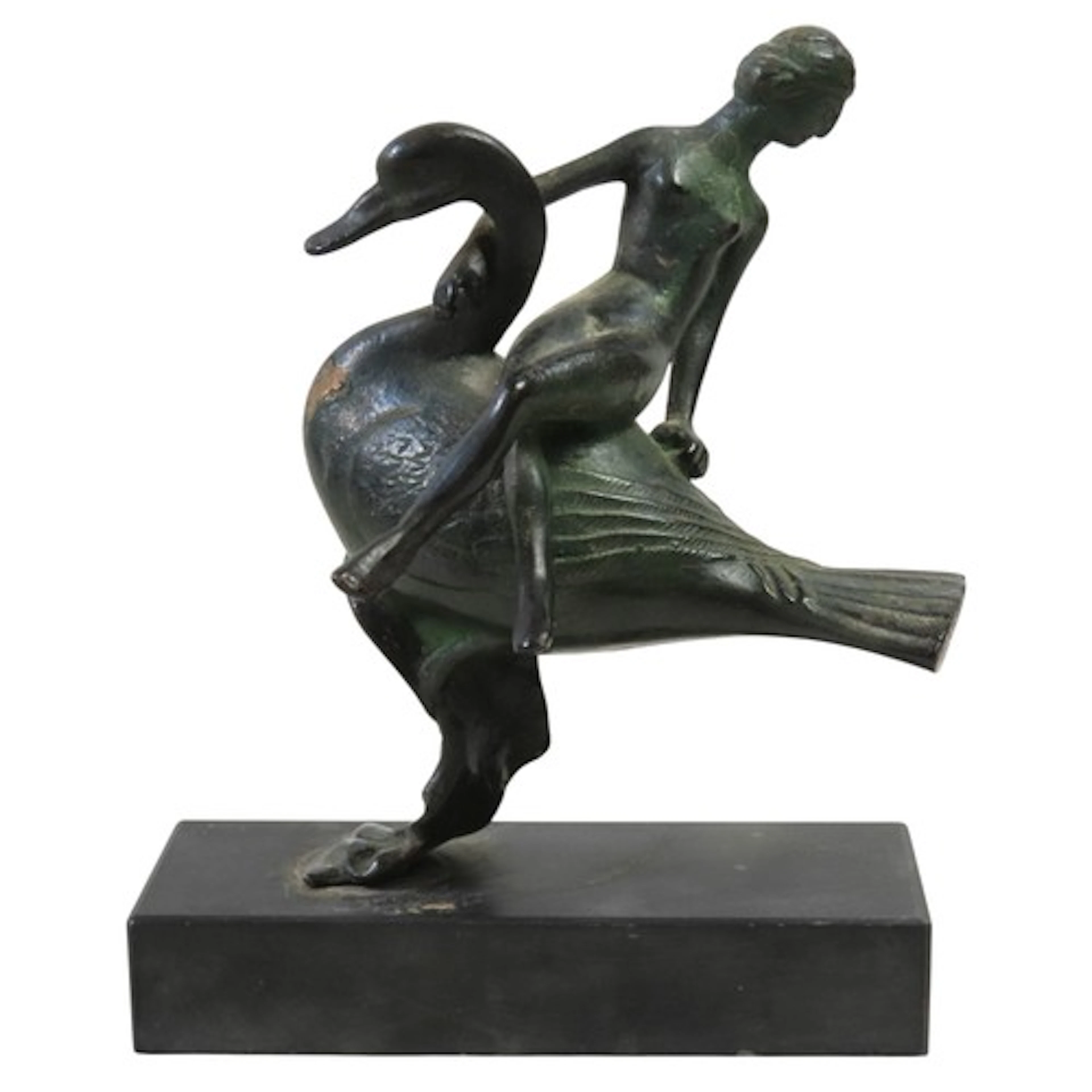 A STYLIZED PATINATED BRONZE GROUP depicting a female figure ...