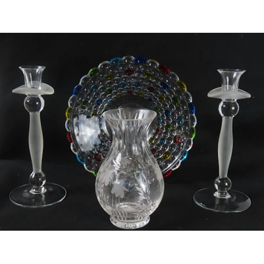 A PAIR OF HANDMADE GLASS CANDLESTICKS with trumpet form nozz...