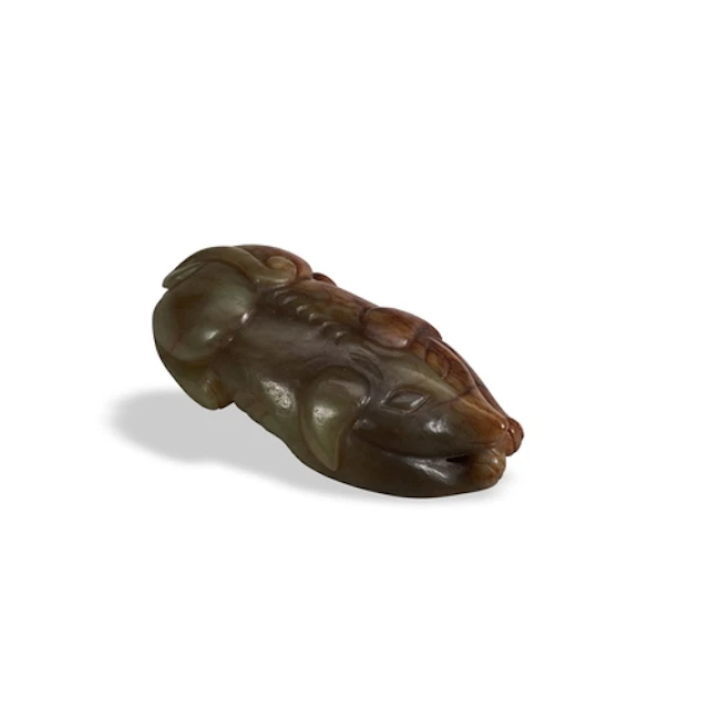 A RUSSET CELADON JADE FIGURE OF A HOUND QING DYNASTY, 19TH ...