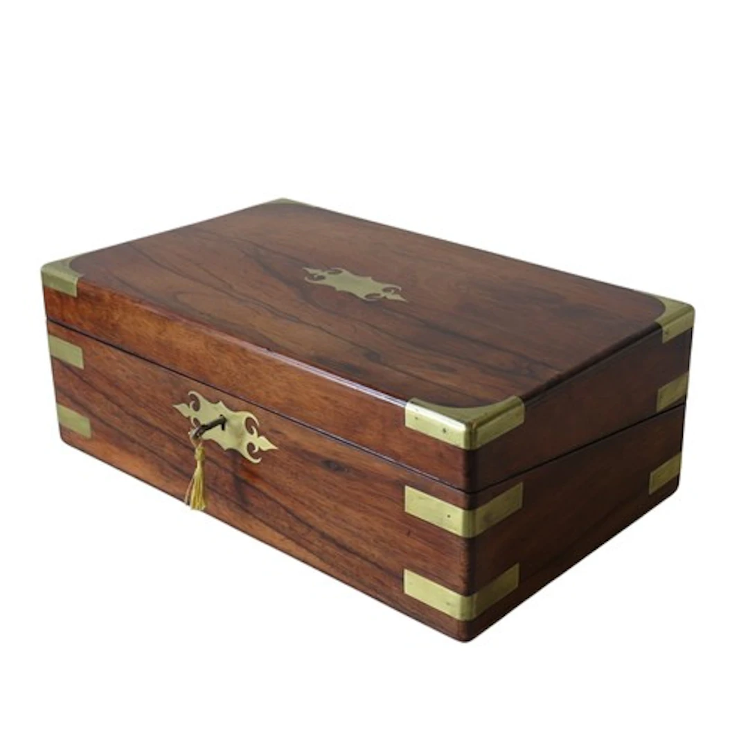 A VICTORIAN ROSEWOOD WRITING SLOPE with brass corner mounts...