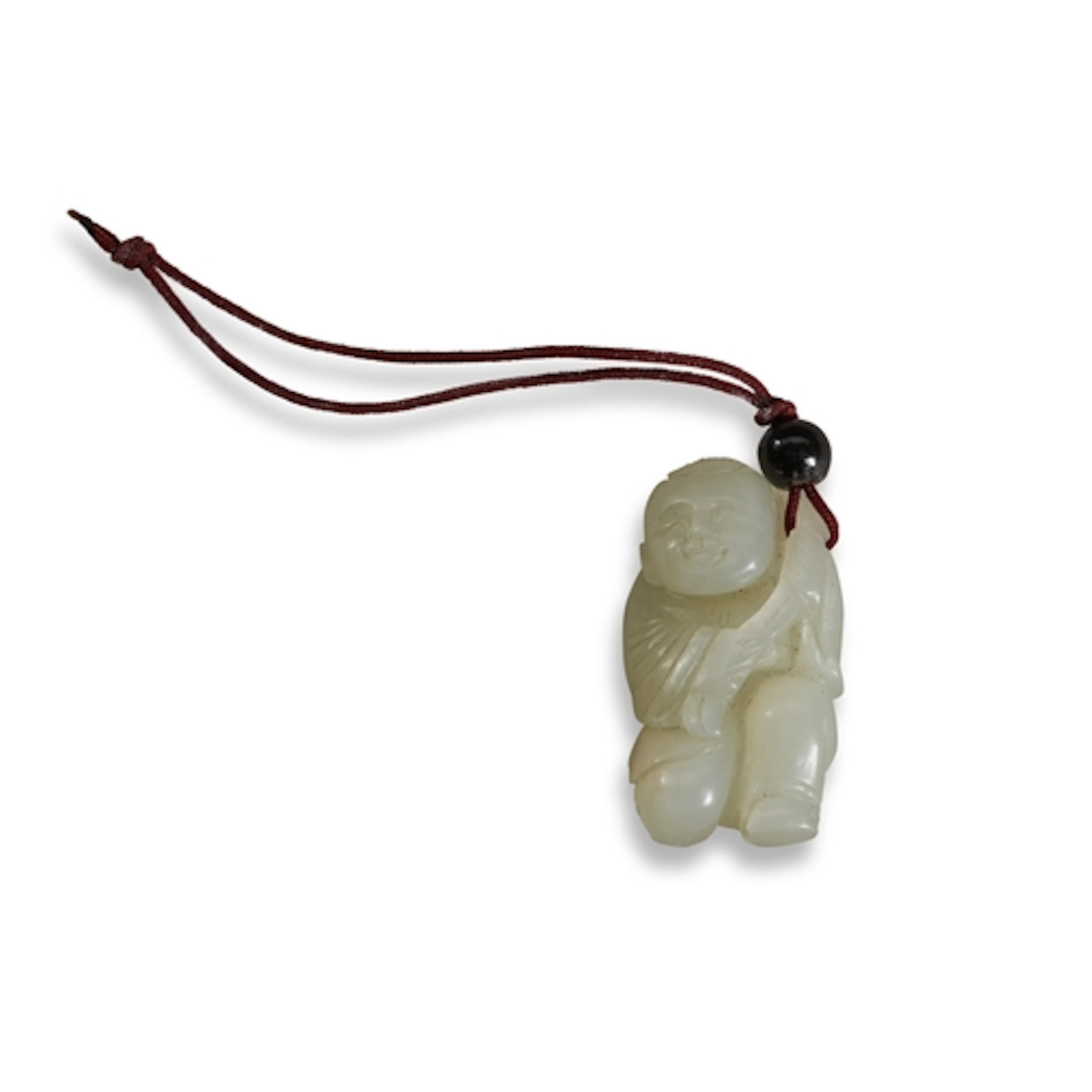 A JADE PENDANT OF A KNEELING BOY,20TH CENTURY 青白玉童子 二十世纪 Ca...