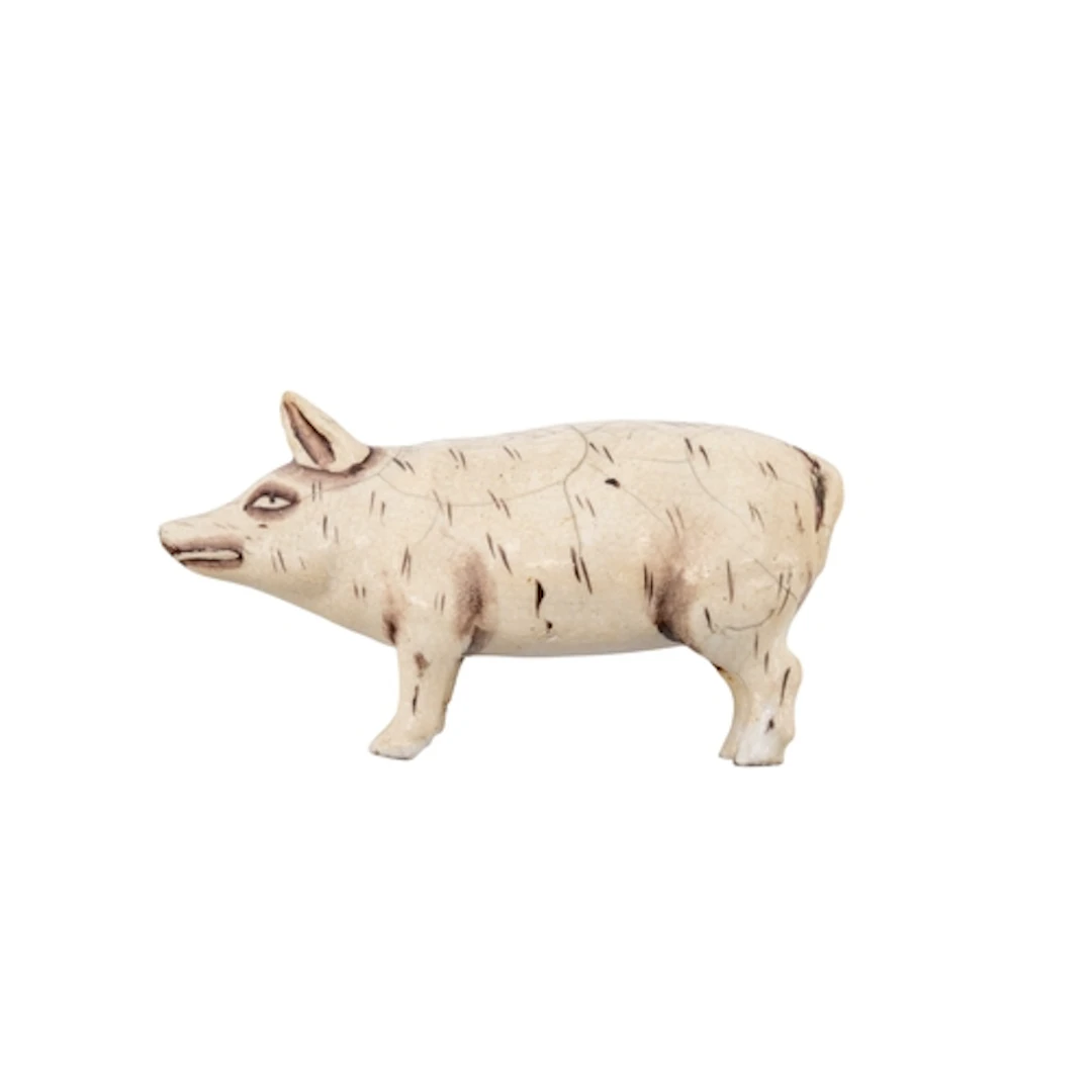 AN UNUSUAL PAINTED POTTERY FIGURE OF A PIG EARLY 19TH CENTUR...