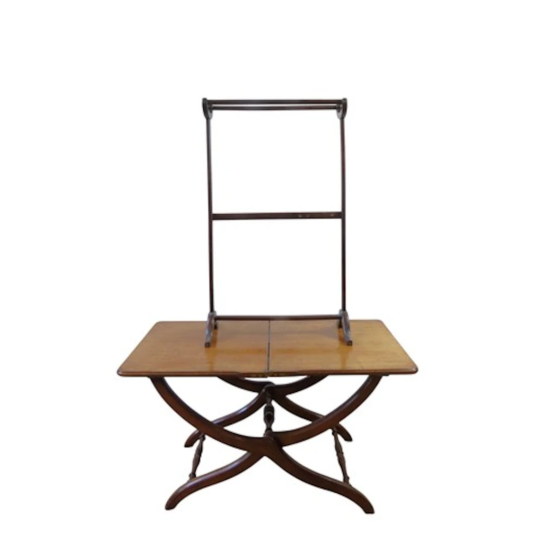 A MAHOGANY COACHING TABLE AND MAHOGANY TOWEL RAIL the coachi...