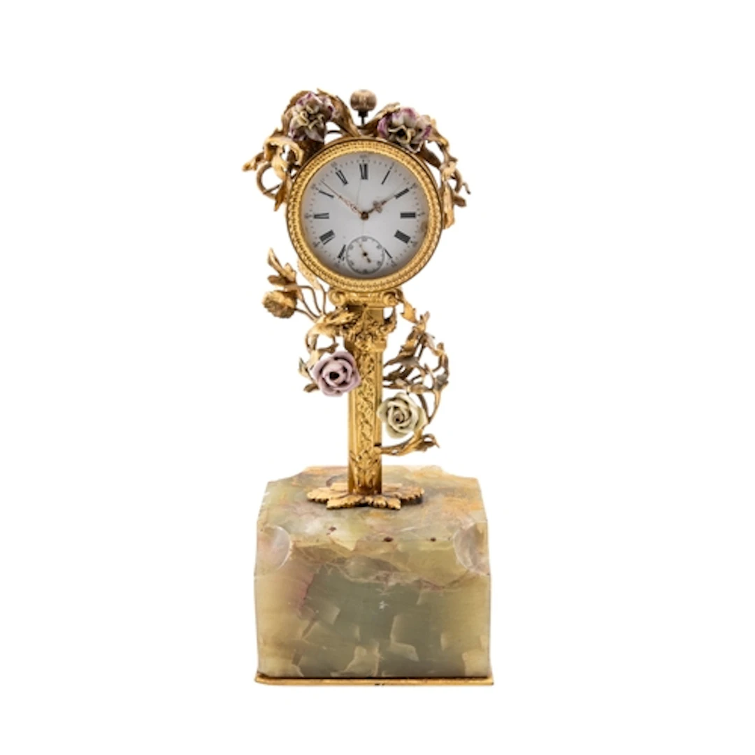 AN ORNATE FRENCH ORMOLU AND ONYX DESK CLOCK LATE 19TH CENTUR...