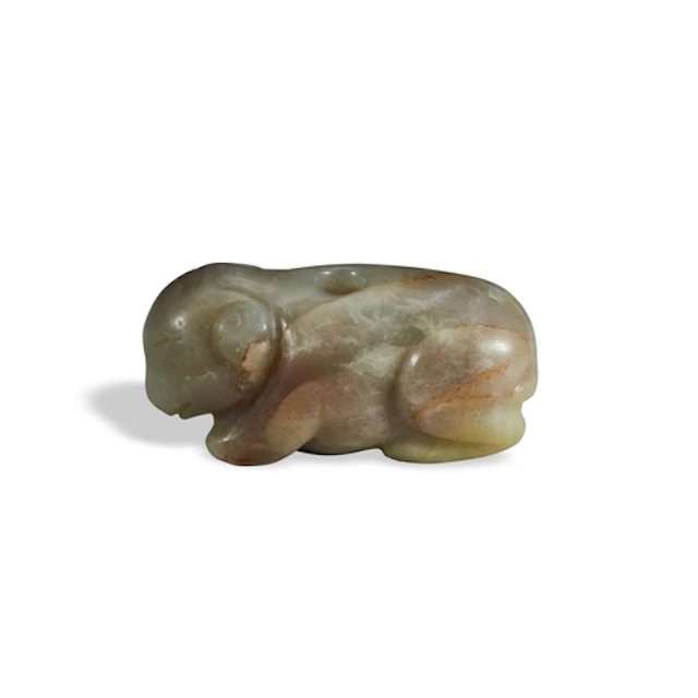 A MOTTLED GREY JADE 'RAM' PENDANT QING DYNASTY, 19TH CENTUR...