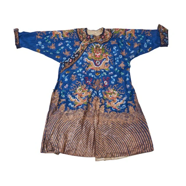 A BLUE GROUND EMBROIDERED SILK DRAGON ROBE LATE QING DYNASTY...