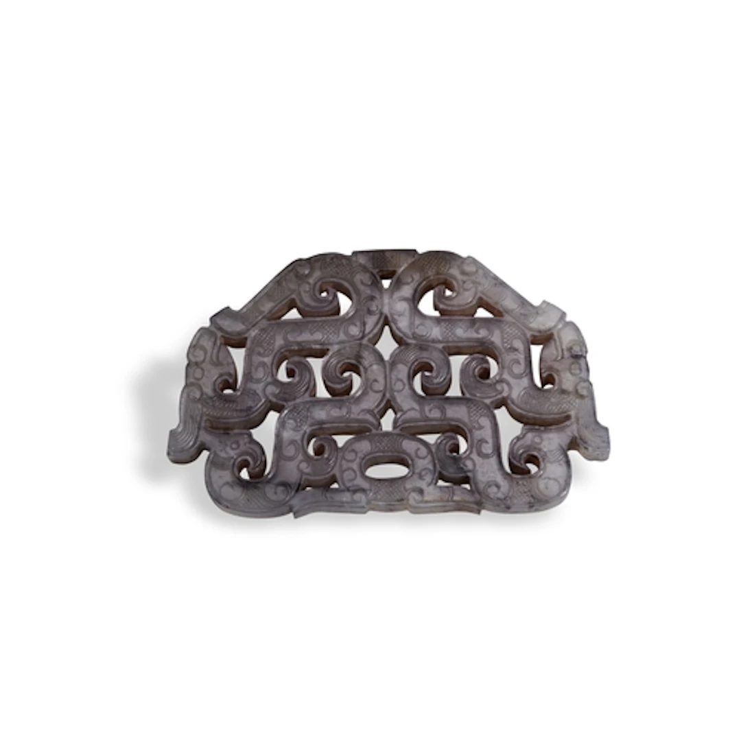 AN ARCHAISTIC JADE DRAGON PENDANT,20TH CENTURY 灰玉螭龙纹牌 二十世纪 T...