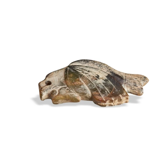A GREEN-BROWN CALCIFIED JADE ARCHAISTIC 'FISH' PENDANT MING ...