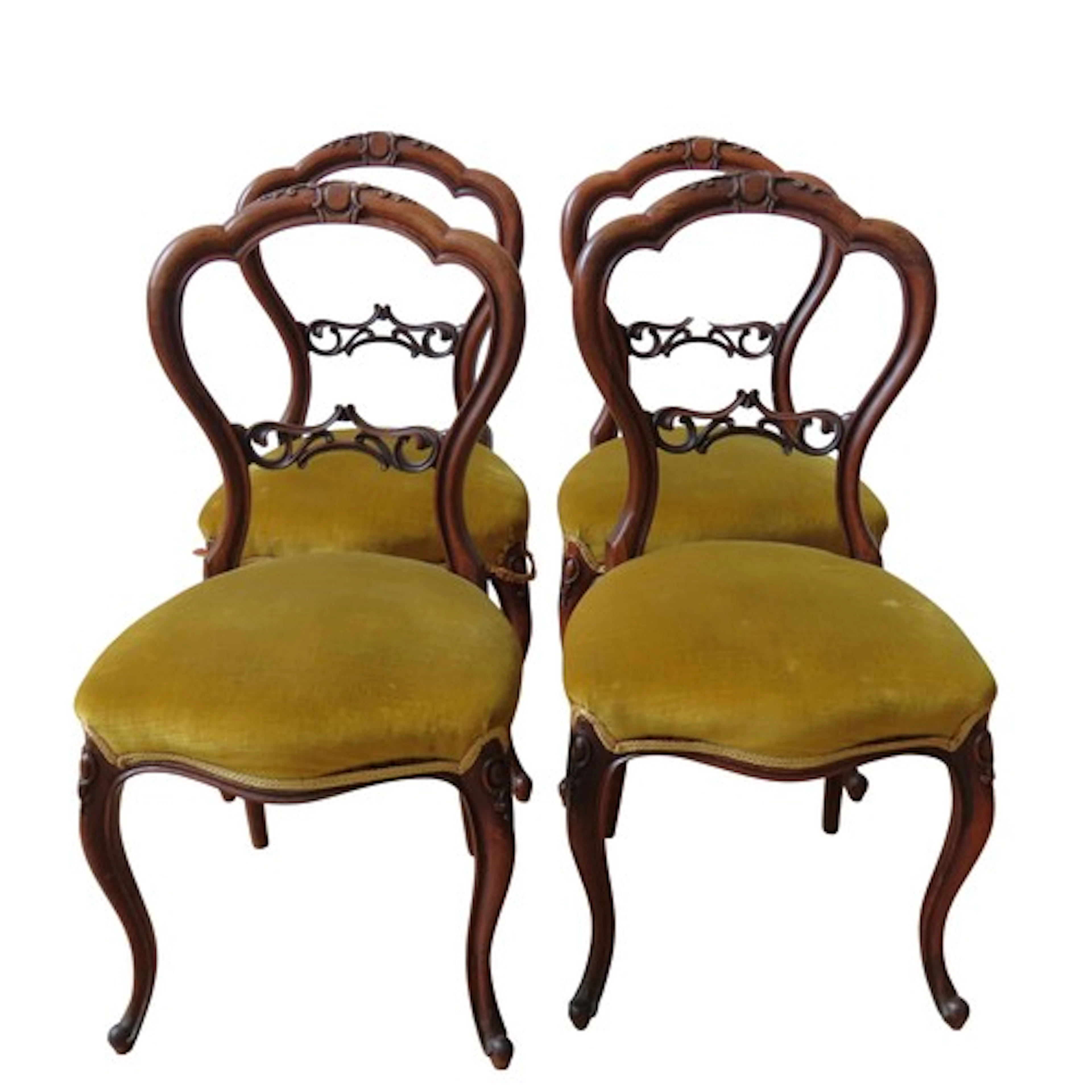 A SET OF FOUR VICTORIAN ROSEWOOD BALLOON BACK CHAIRS with pi...