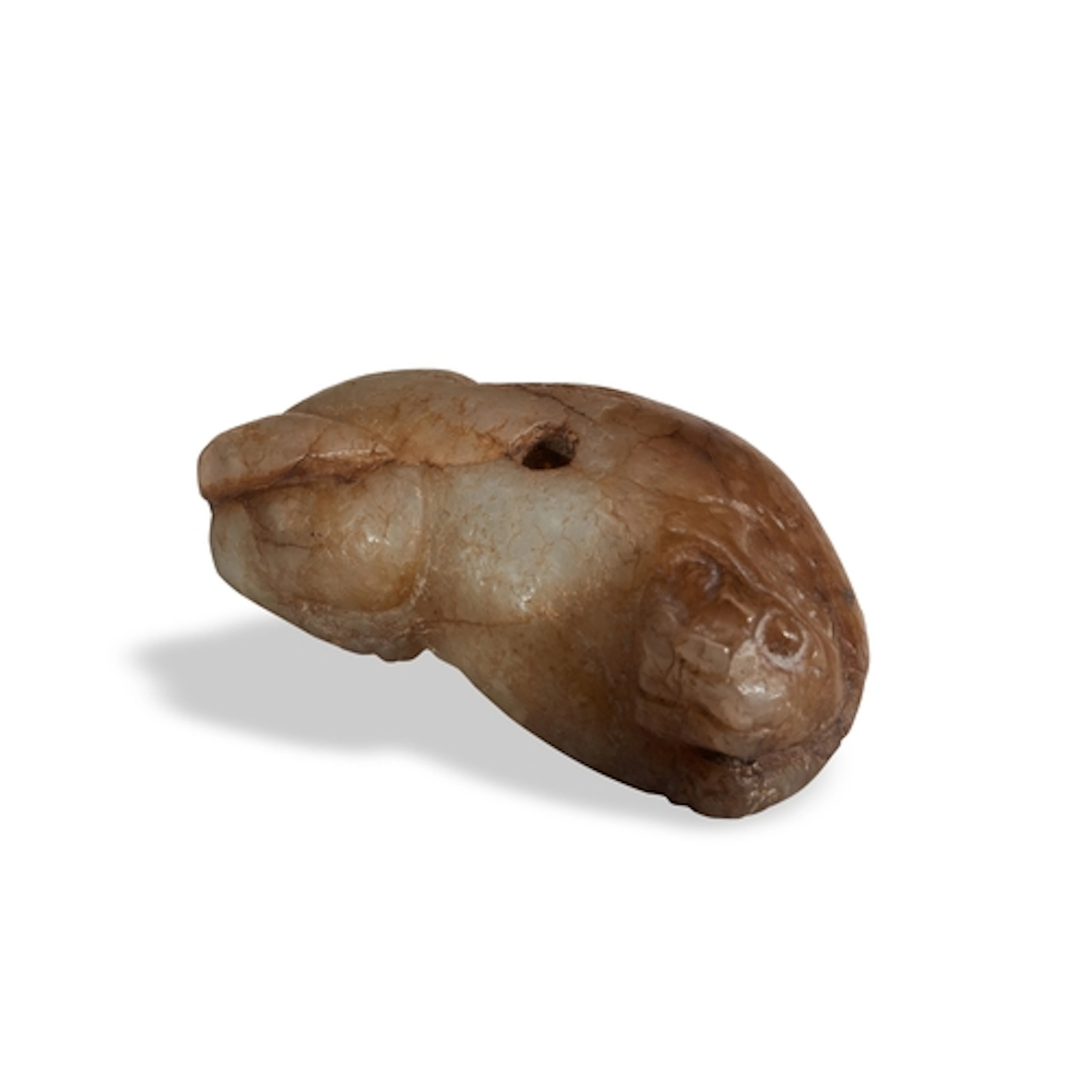 A MOTTLED CREAM-RUSSET JADE 'LION' PENDANT QING DYNASTY, 19T...