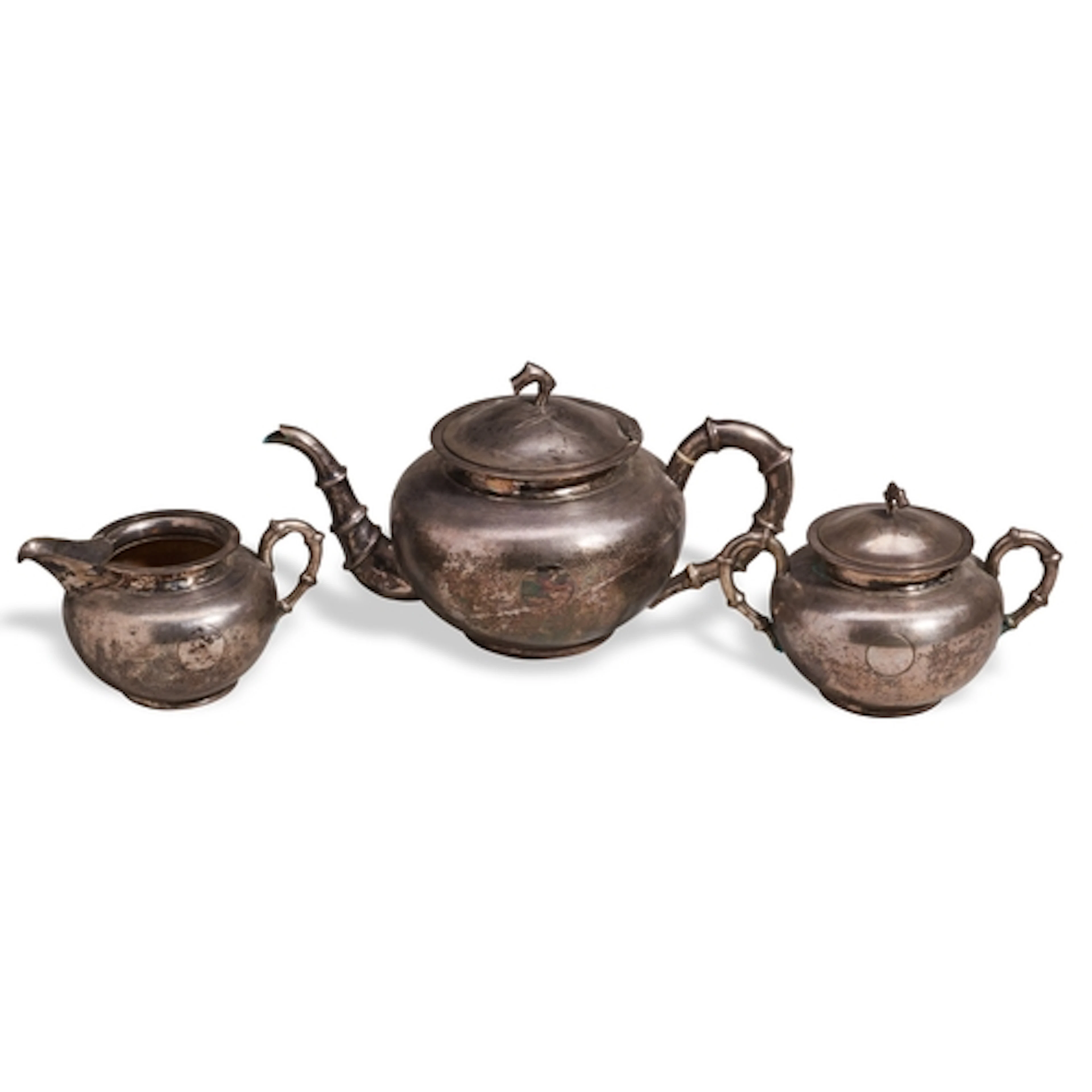A CHINESE EXPORT THREE-PIECE SILVER TEA SERVICE, LATE QING ...