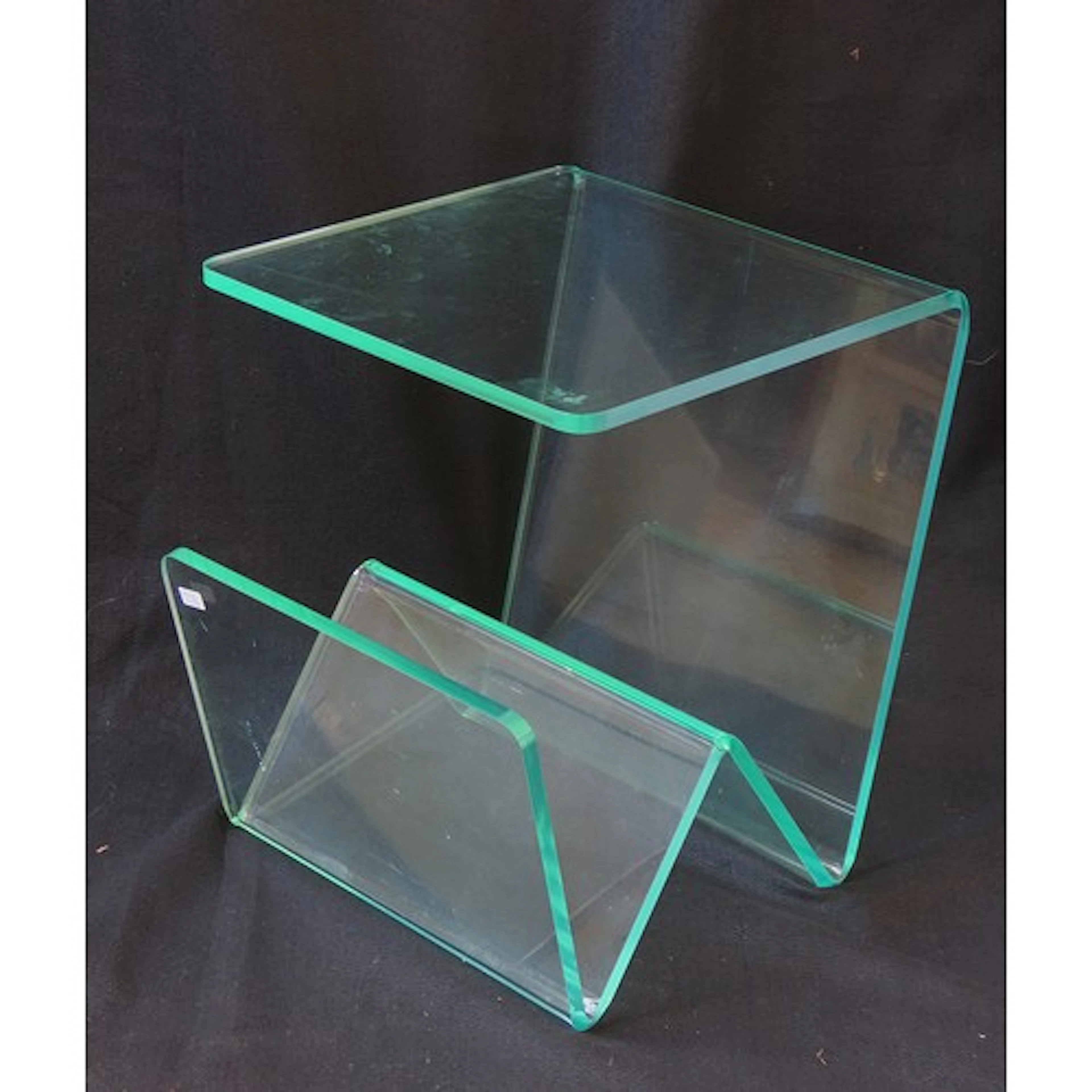 A CONTEMPORARY PERSPEX MAGAZINE RACK/TABLE 43 x 35 x 34 cm...