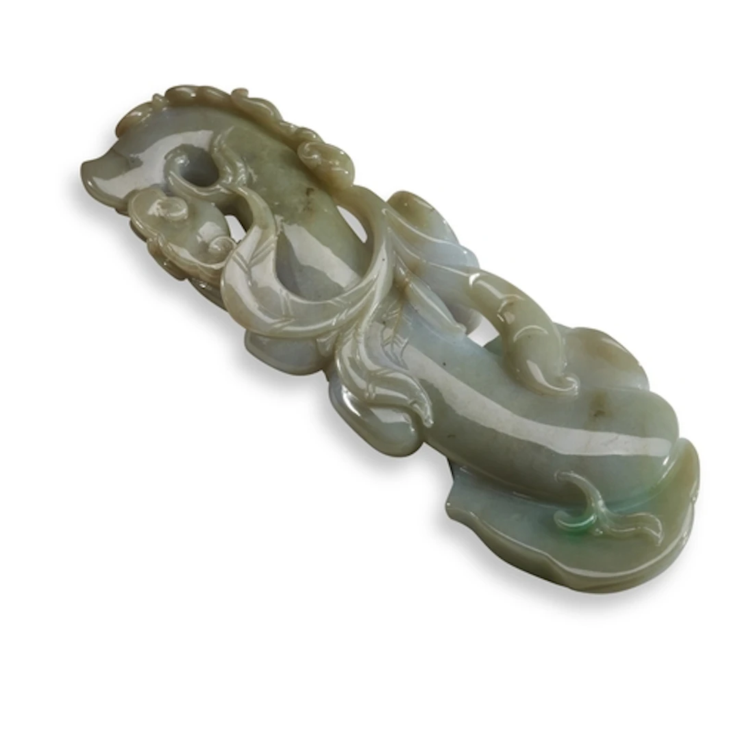 A JADEITE BRUSH REST, 20TH CENTURY 翡翠笔架 二十世纪 Carved in the f...