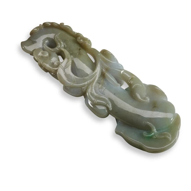 A JADEITE BRUSH REST, 20TH CENTURY 翡翠笔架 二十世纪 Carved in the f...