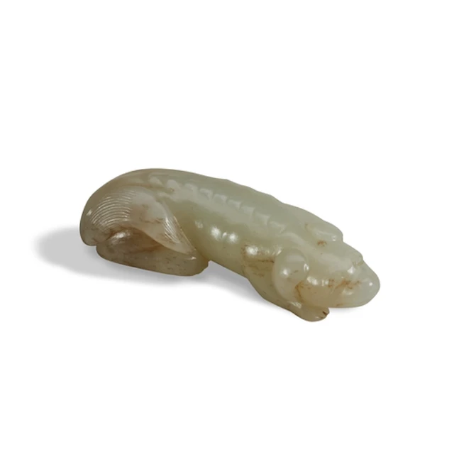 A GOOD WHITE JADE 'DOG' PENDANT QING DYNASTY, 18TH / 19TH C...